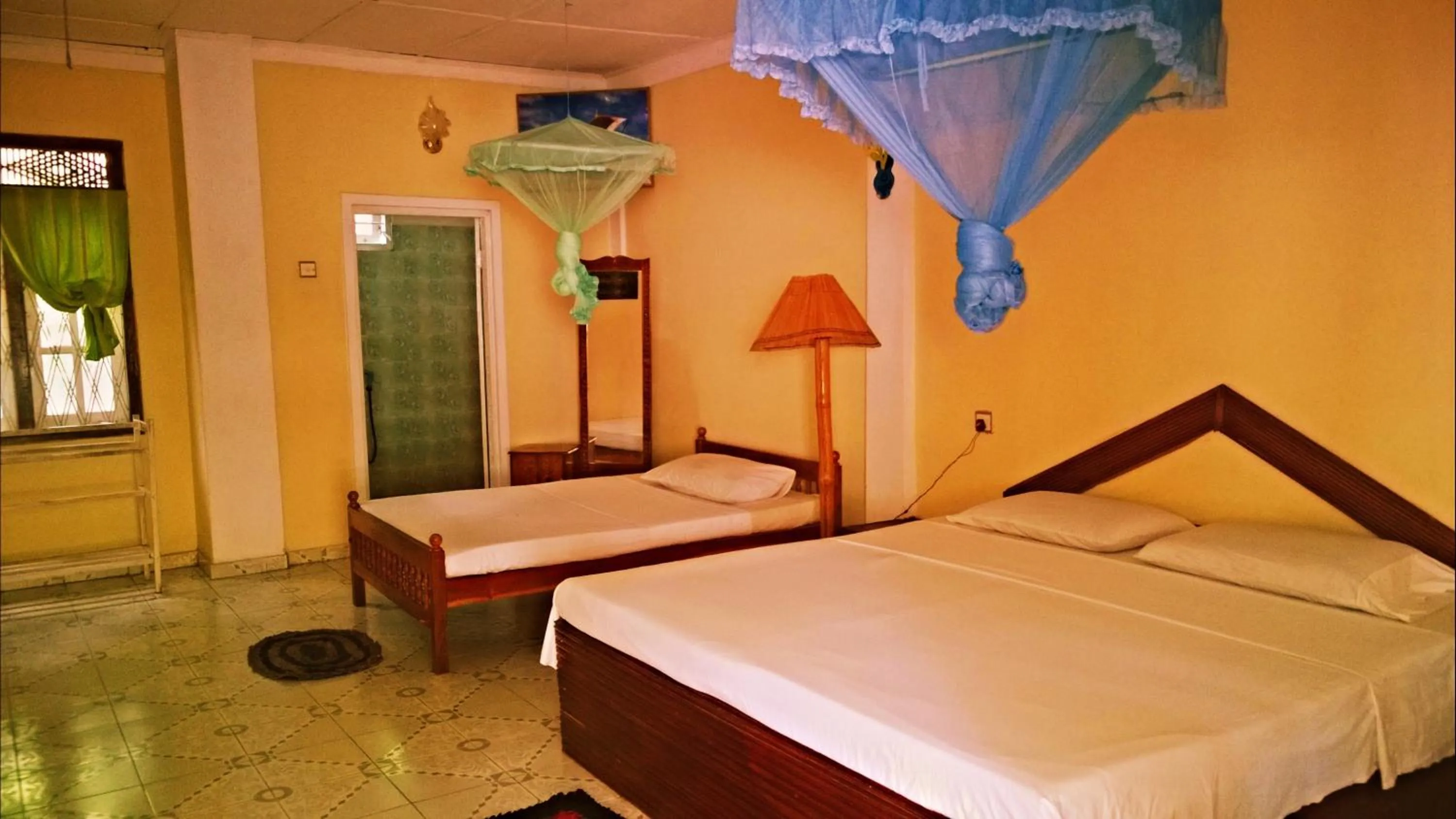 Bed in Sigiri Holiday Inn