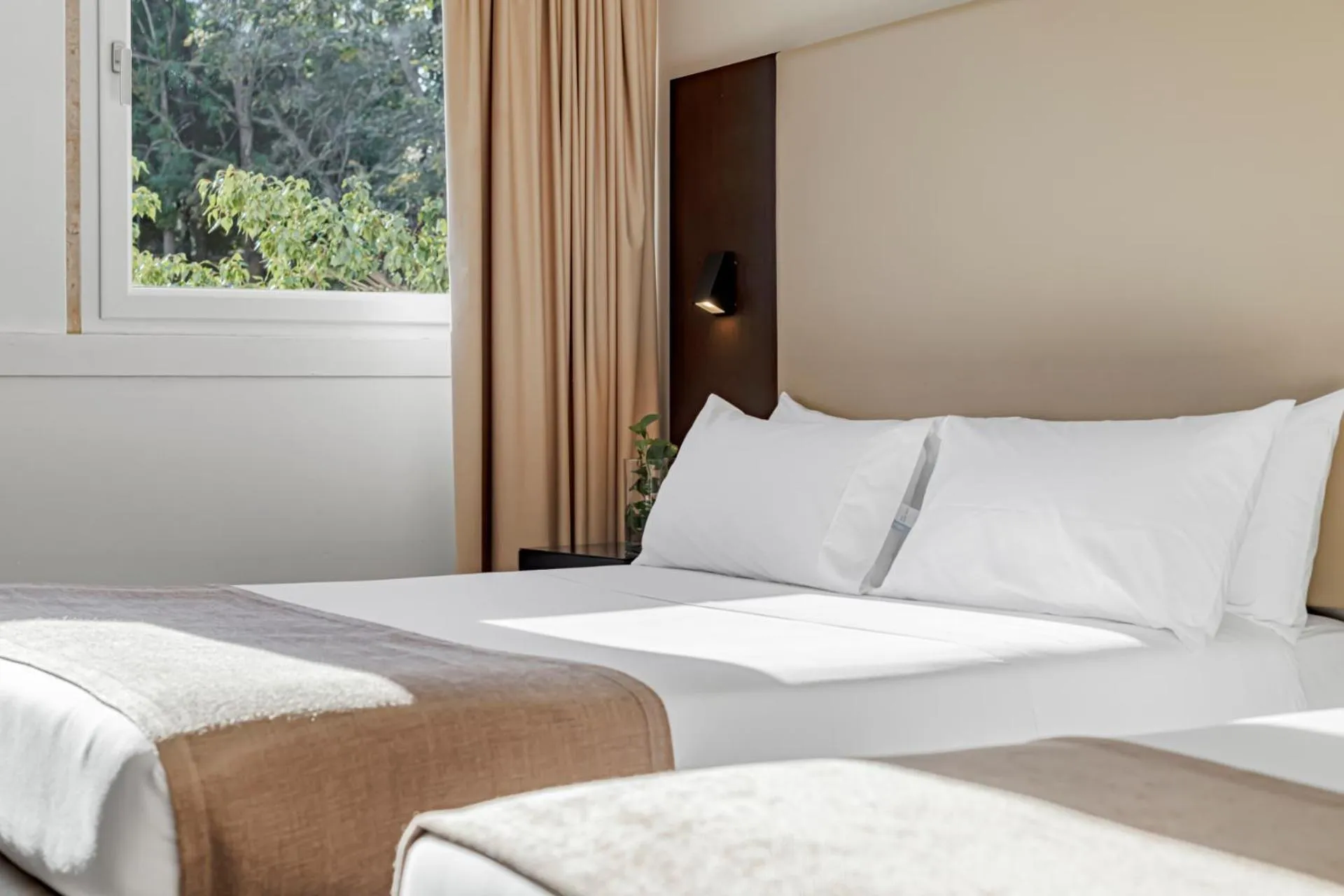 Bed in Lisboa Central Park Hotel Suites & Studios