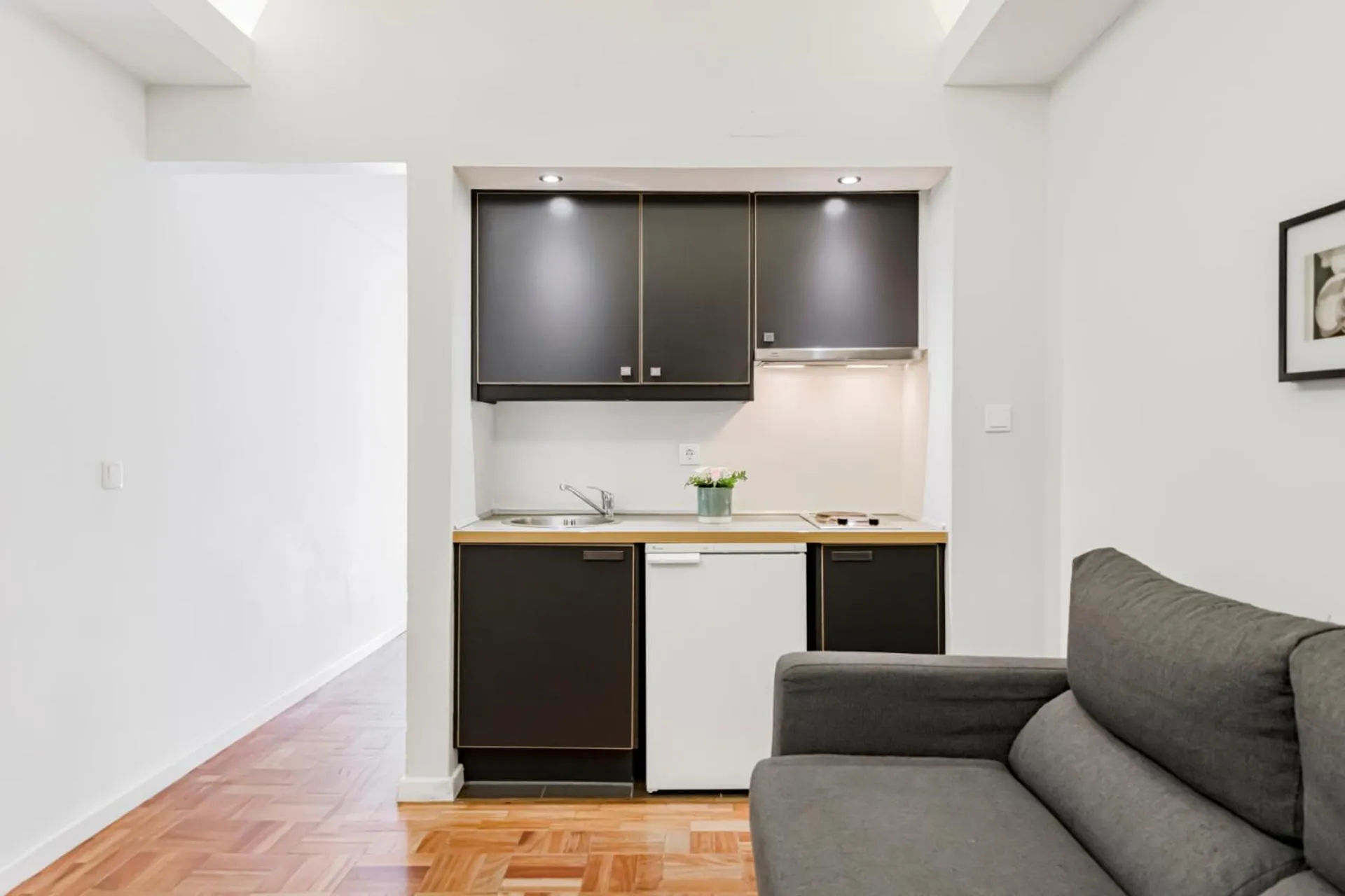 Kitchen or kitchenette in Lisboa Central Park Hotel Suites & Studios