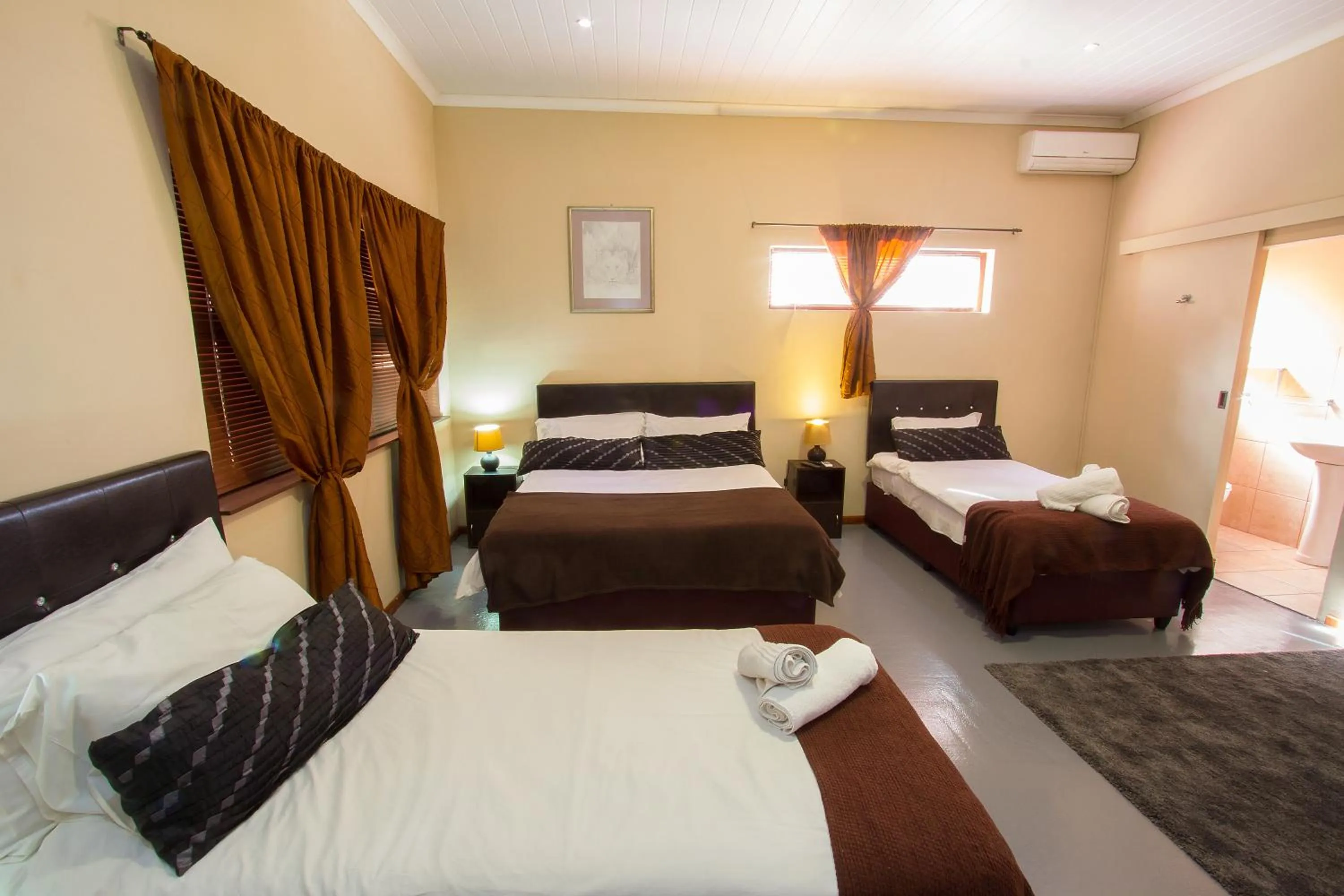 Photo of the whole room, Bed in Ramasibi Guest Services