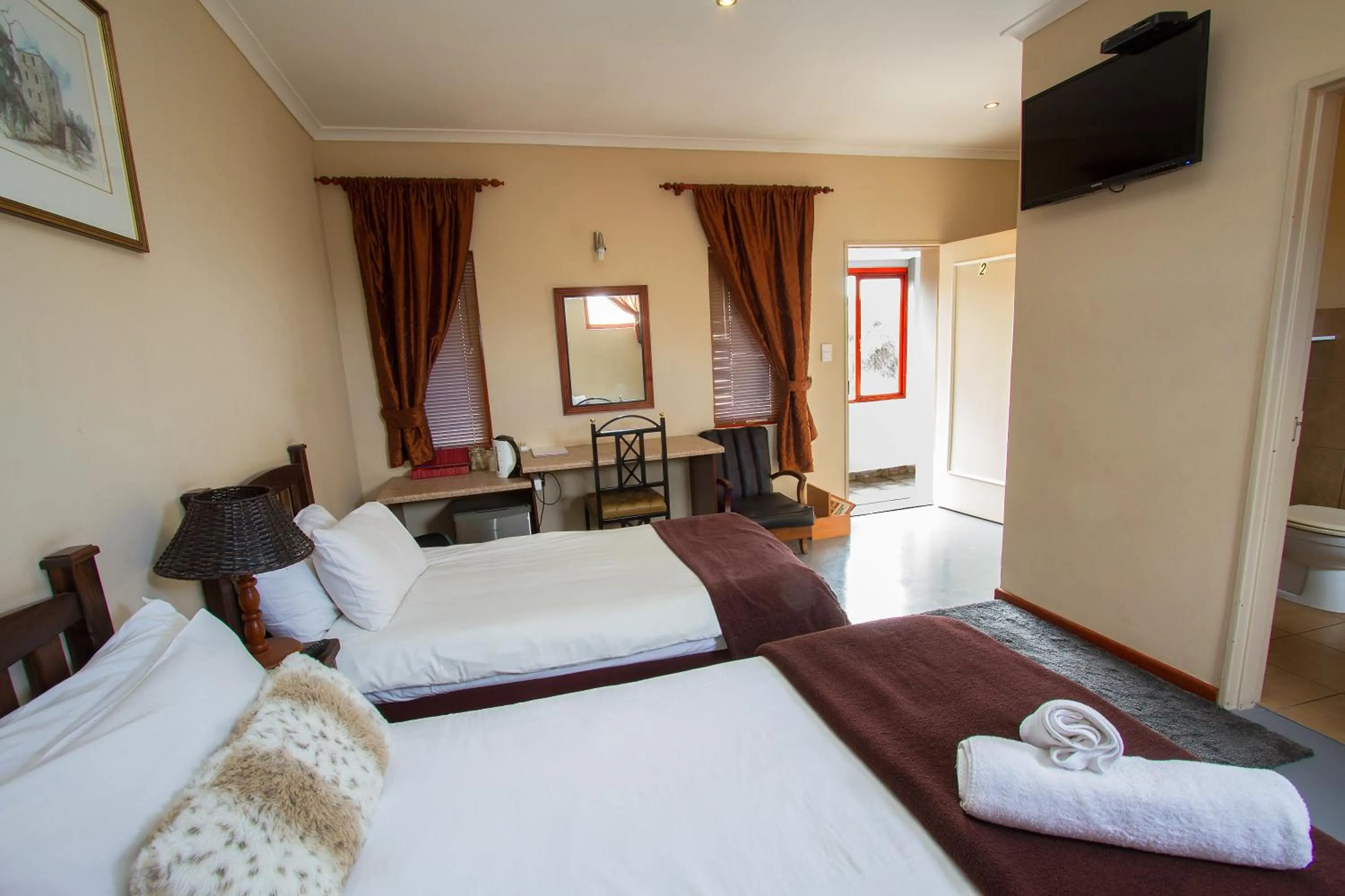 Photo of the whole room, Bed in Ramasibi Guest Services