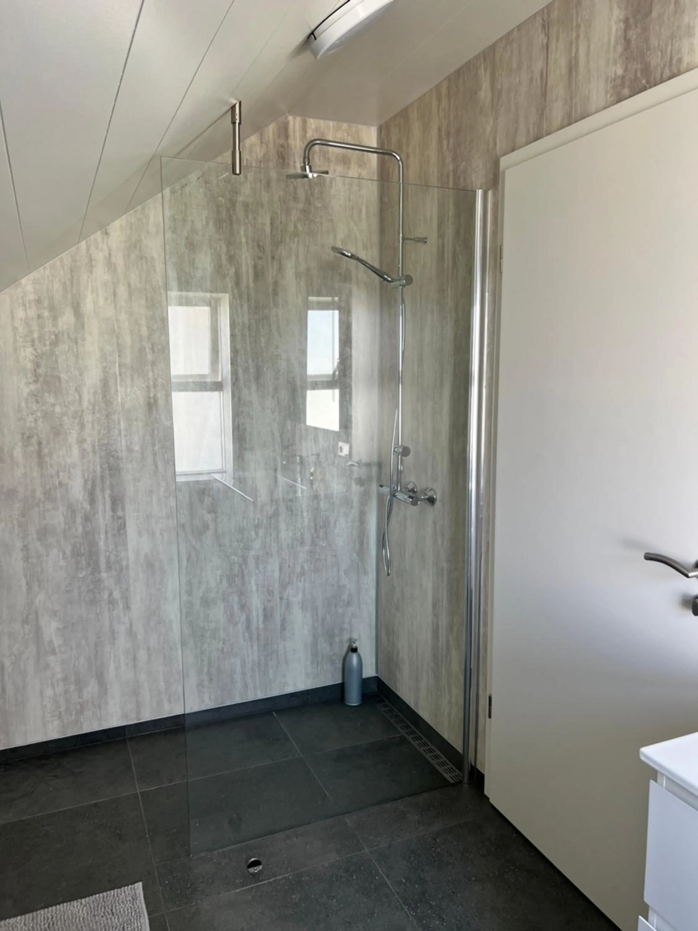 Shower in Hvammur Apartments by the Harbour