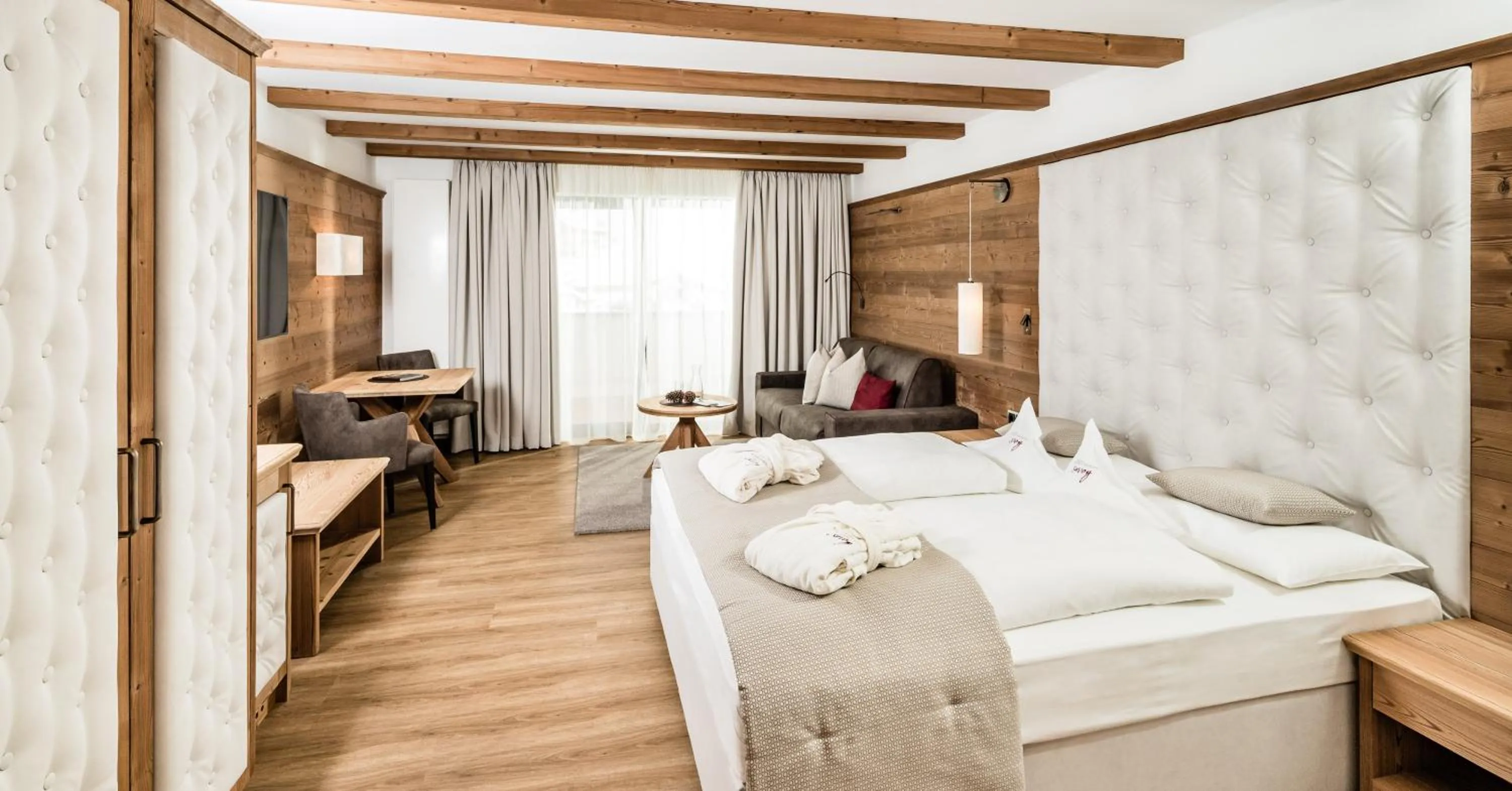Bed in Savoy Dolomites Luxury & Spa Hotel