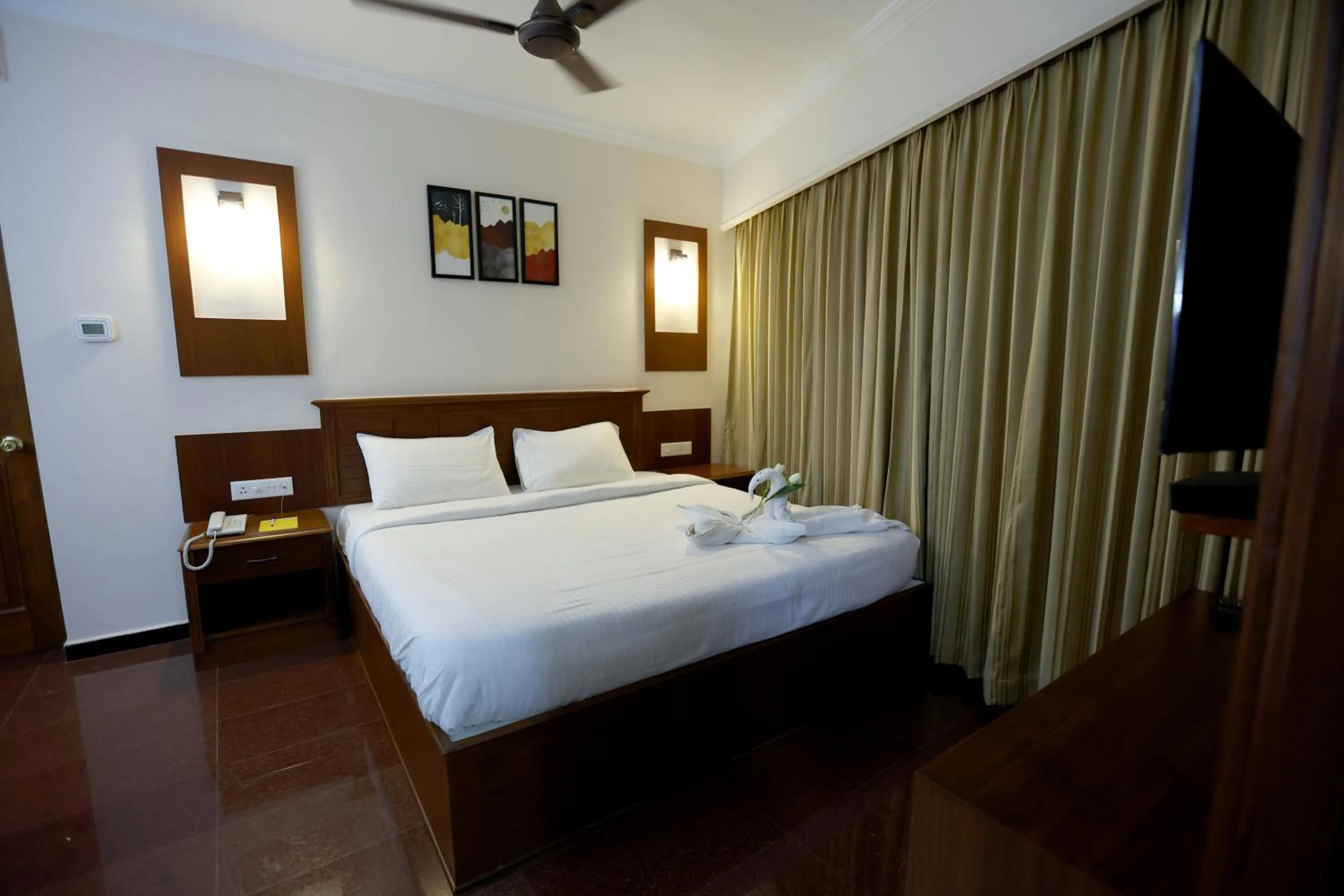 Bed in Breeze Residency