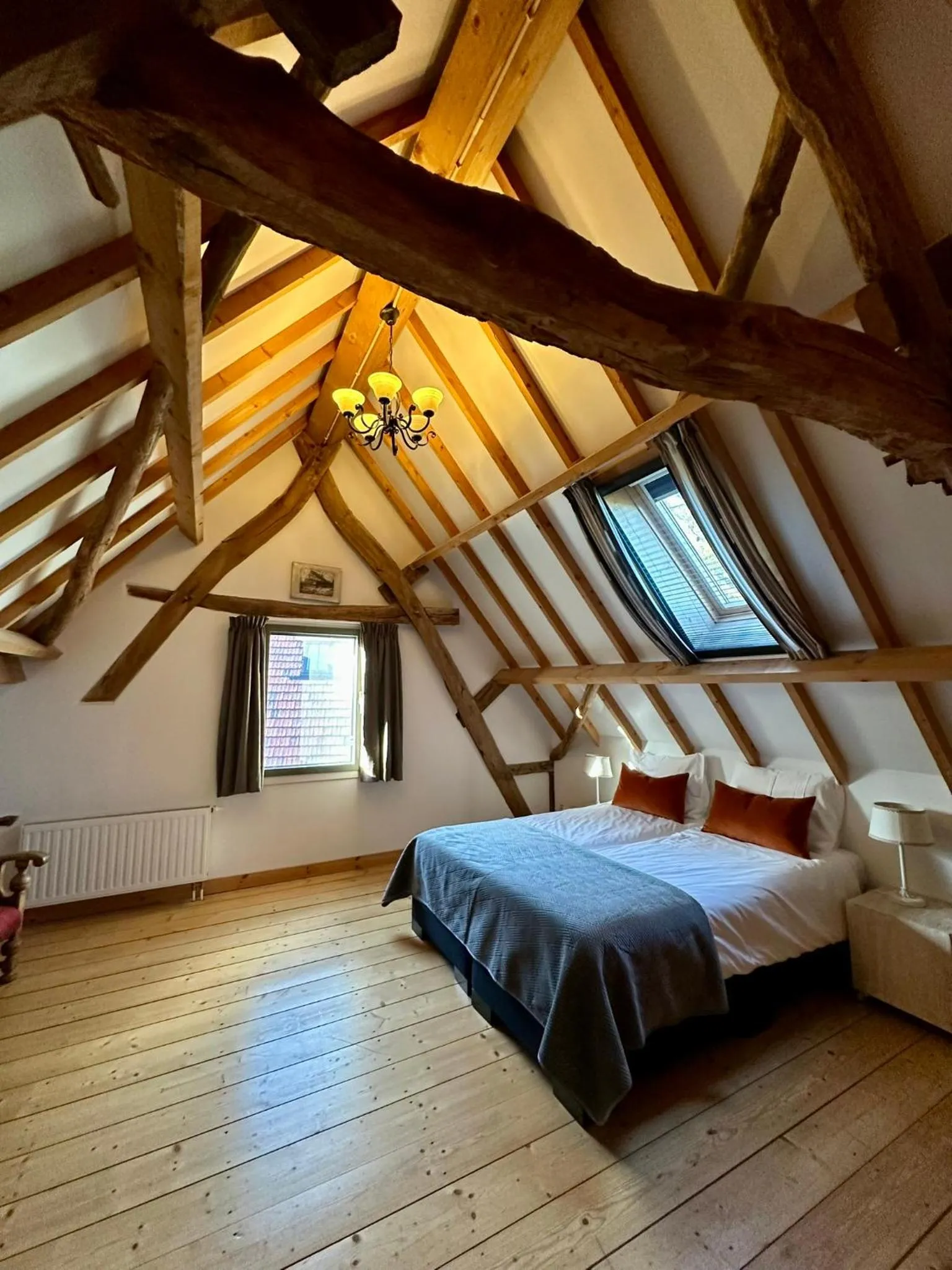 Bed in Erfgoed & Logies Den Heijkant