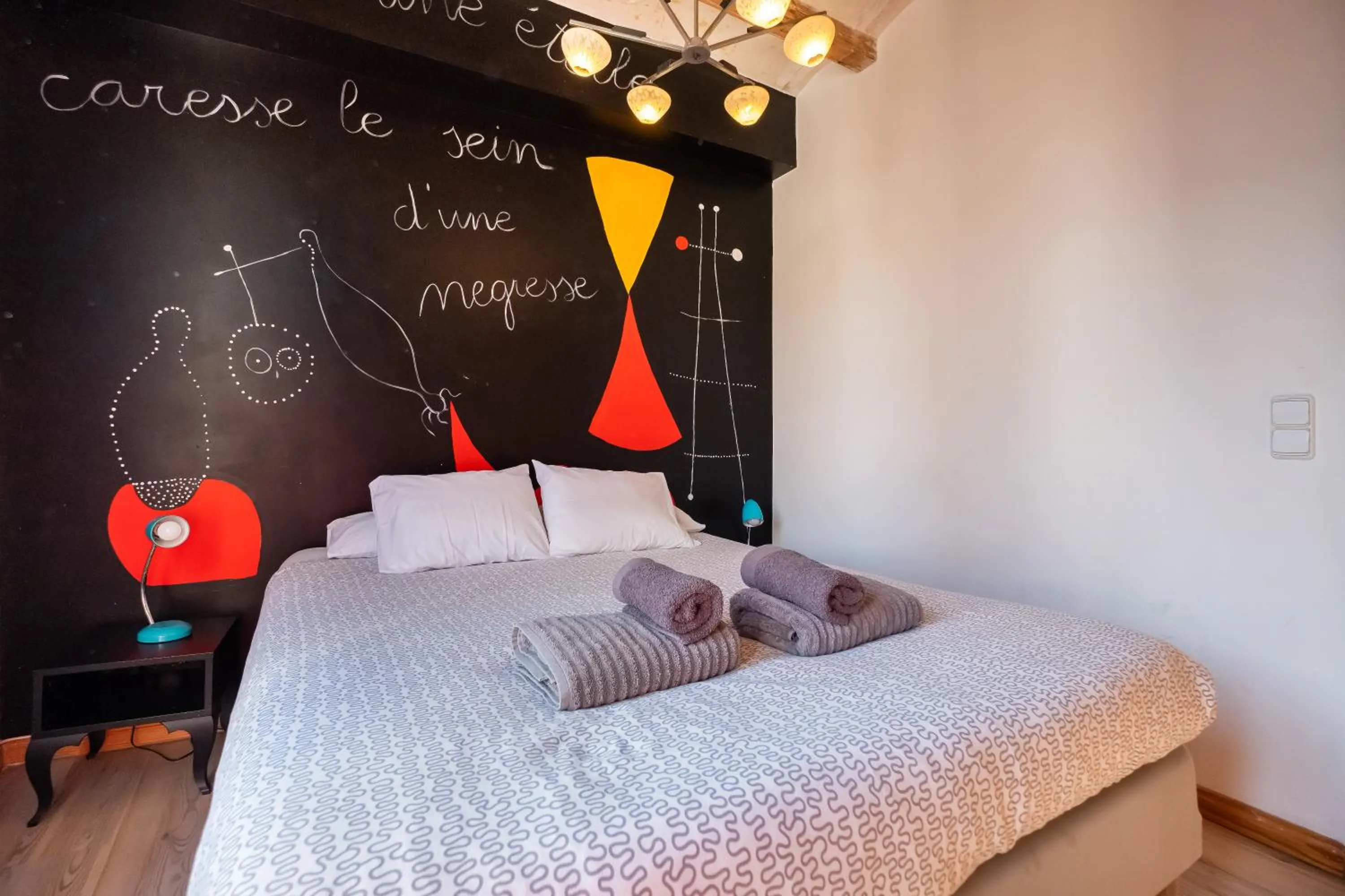 Bed in Apartamentos El Pintor