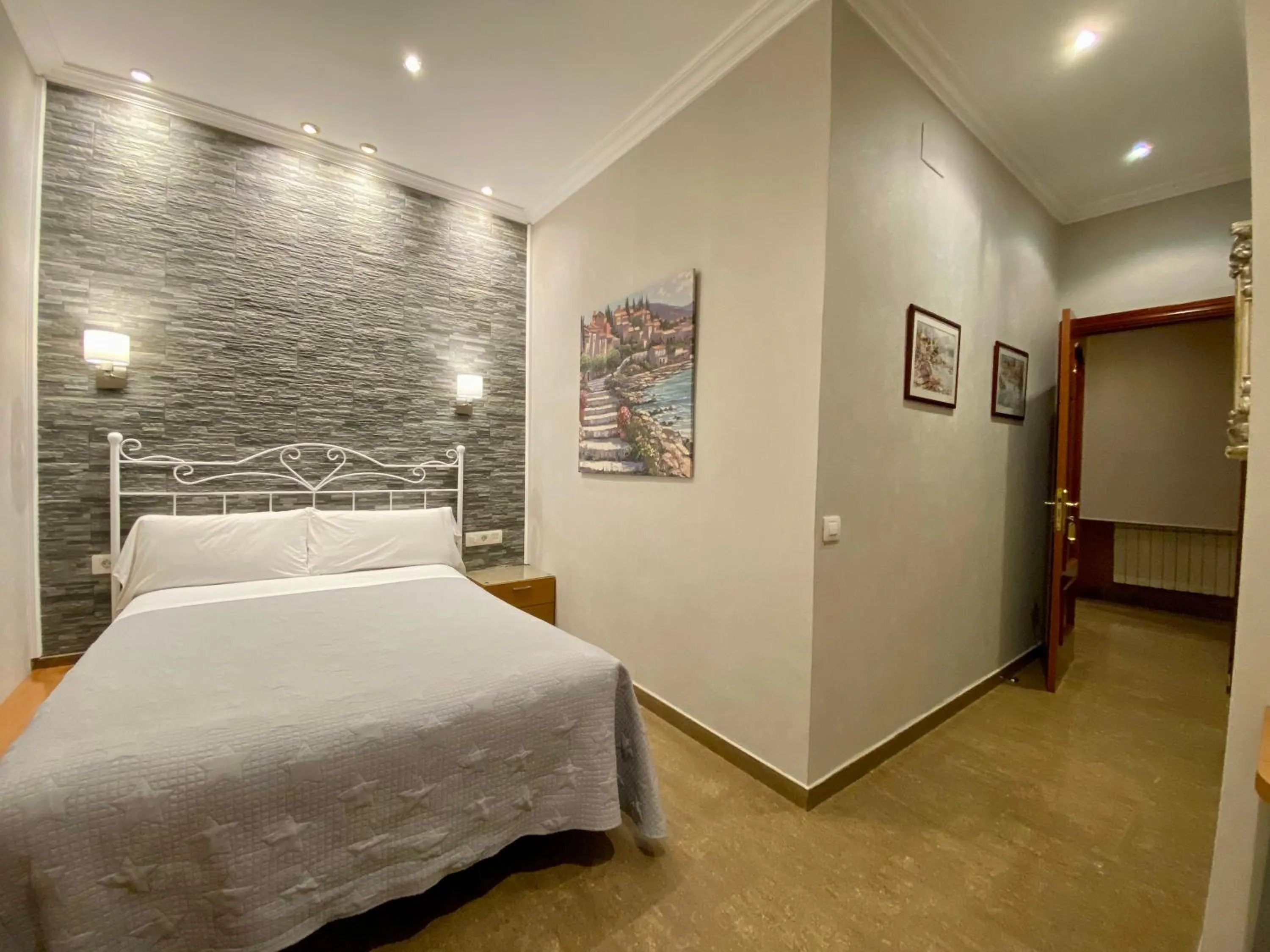 Bed in Hostal Orleans