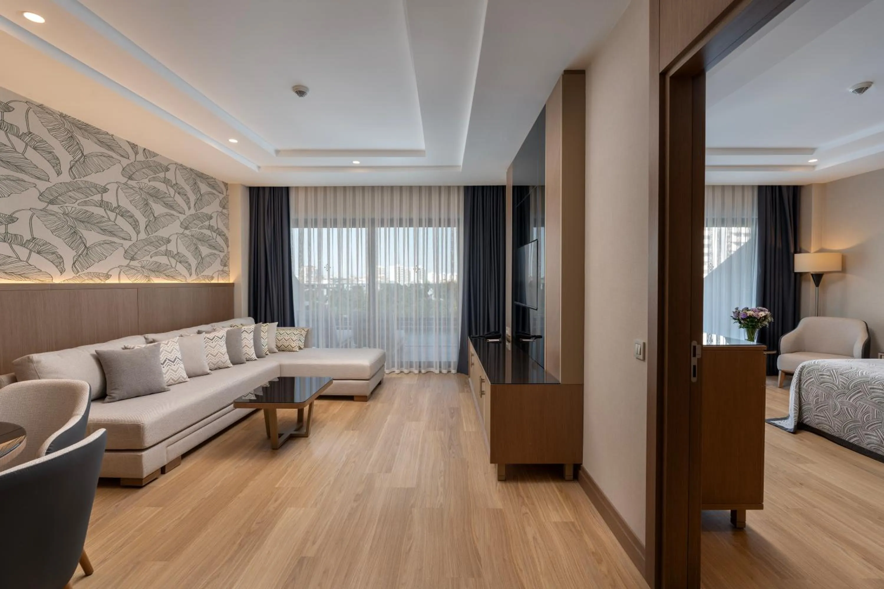 Living room, Bed in Miracle Resort Hotel