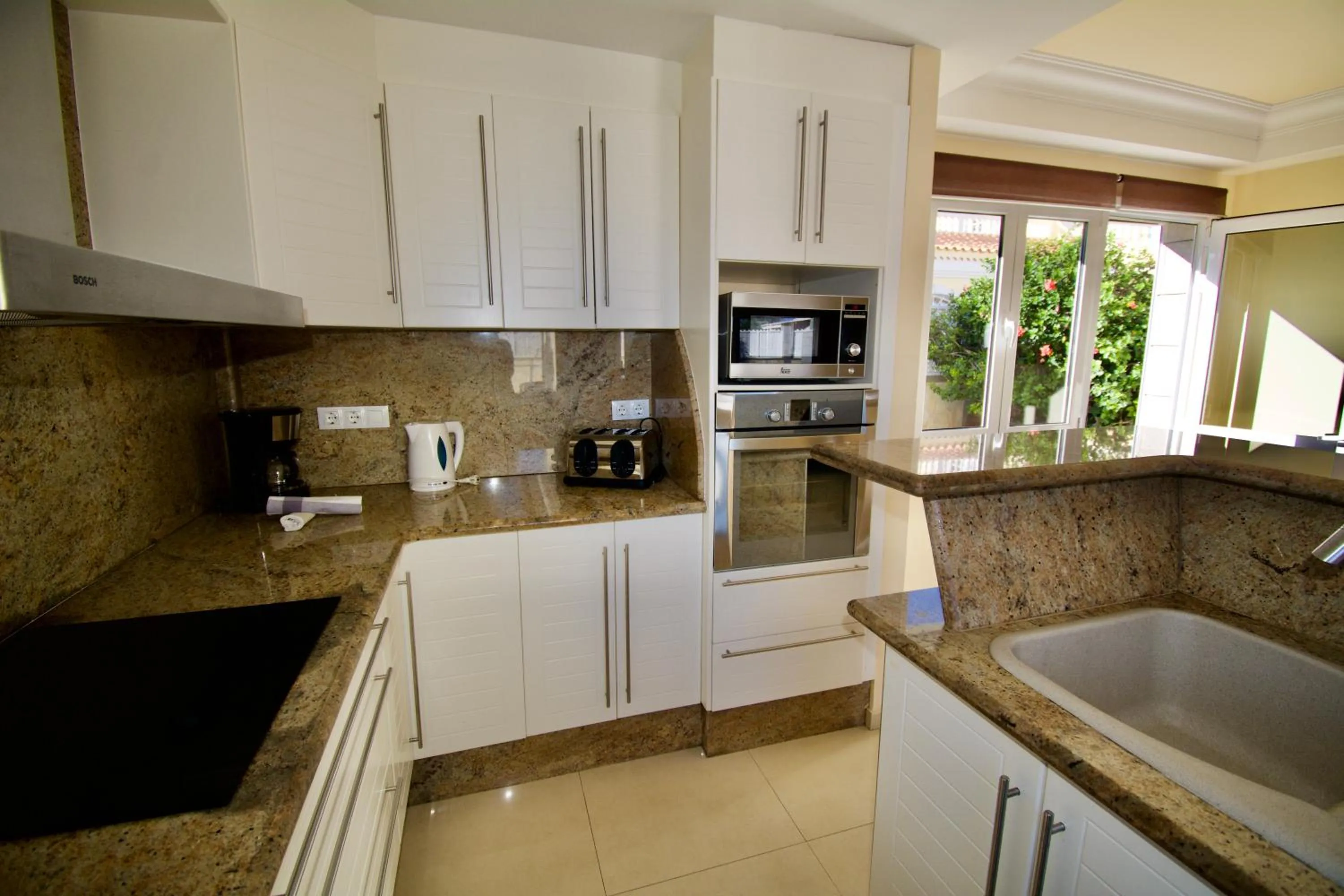 Kitchen or kitchenette in Villa Lovisi