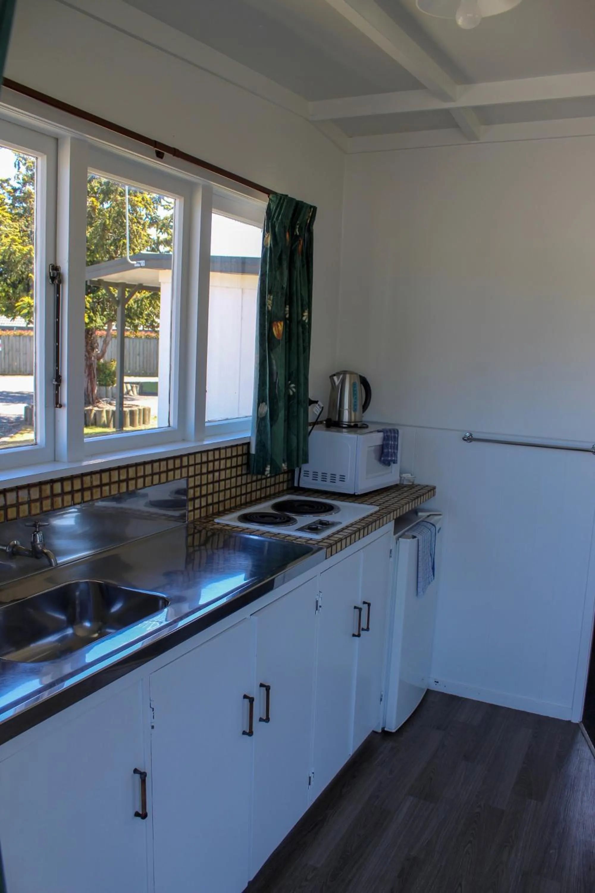 Kitchen or kitchenette in Holdens Bay Holiday Park