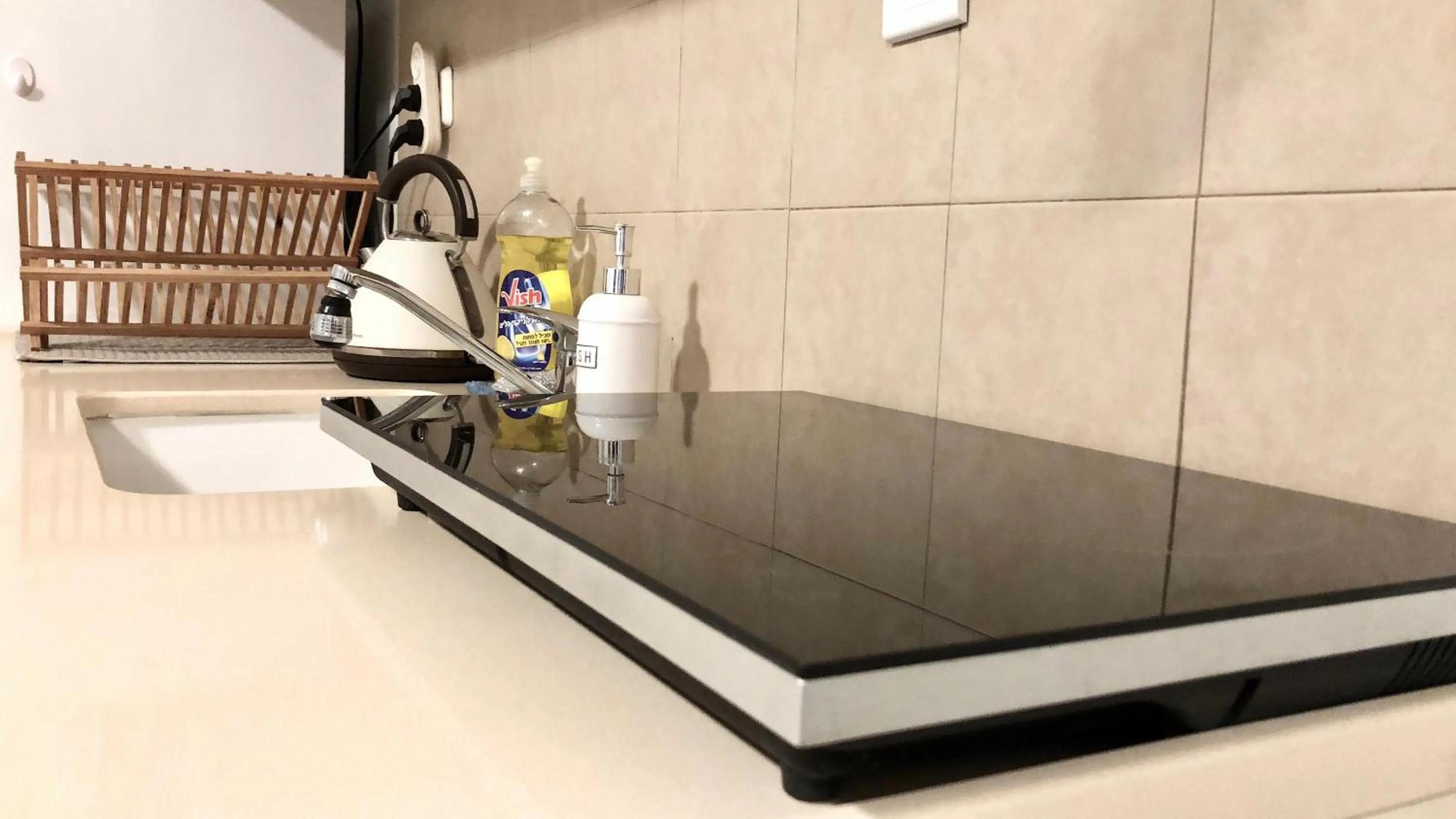 Kitchen or kitchenette in Stylish Tel Aviv