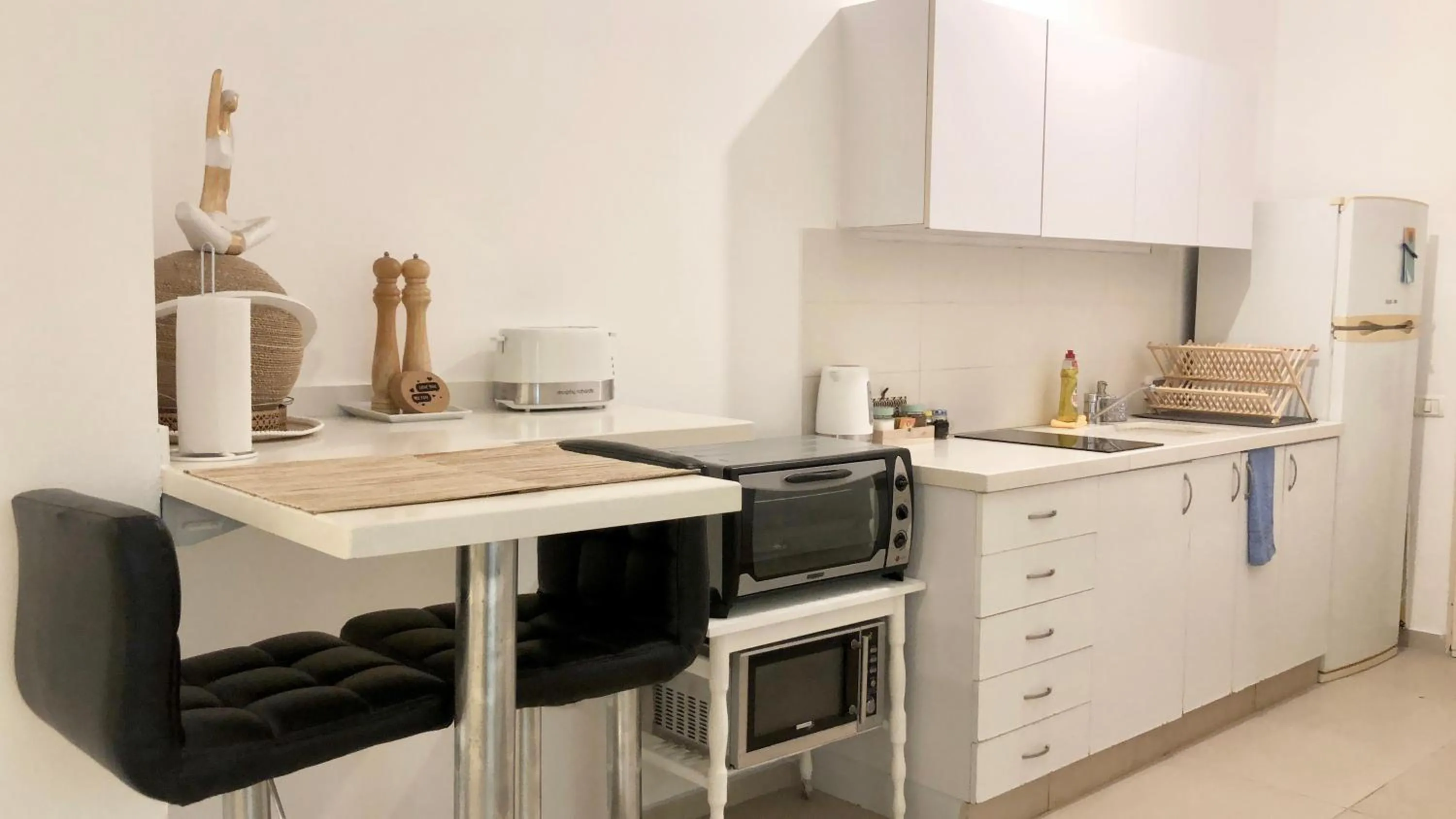 Kitchen or kitchenette in Stylish Tel Aviv
