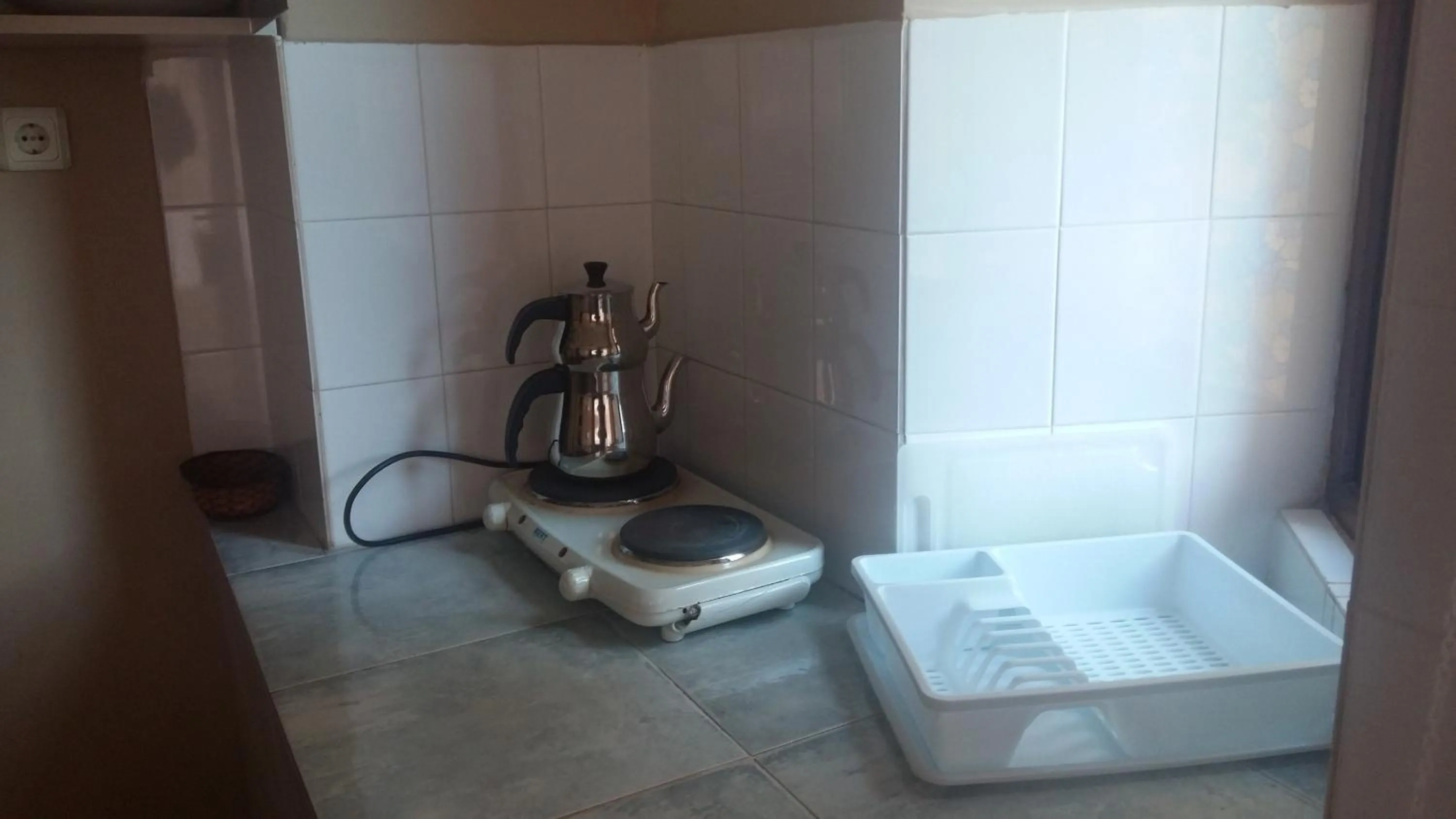 Kitchen or kitchenette in Musti Apart Hotel