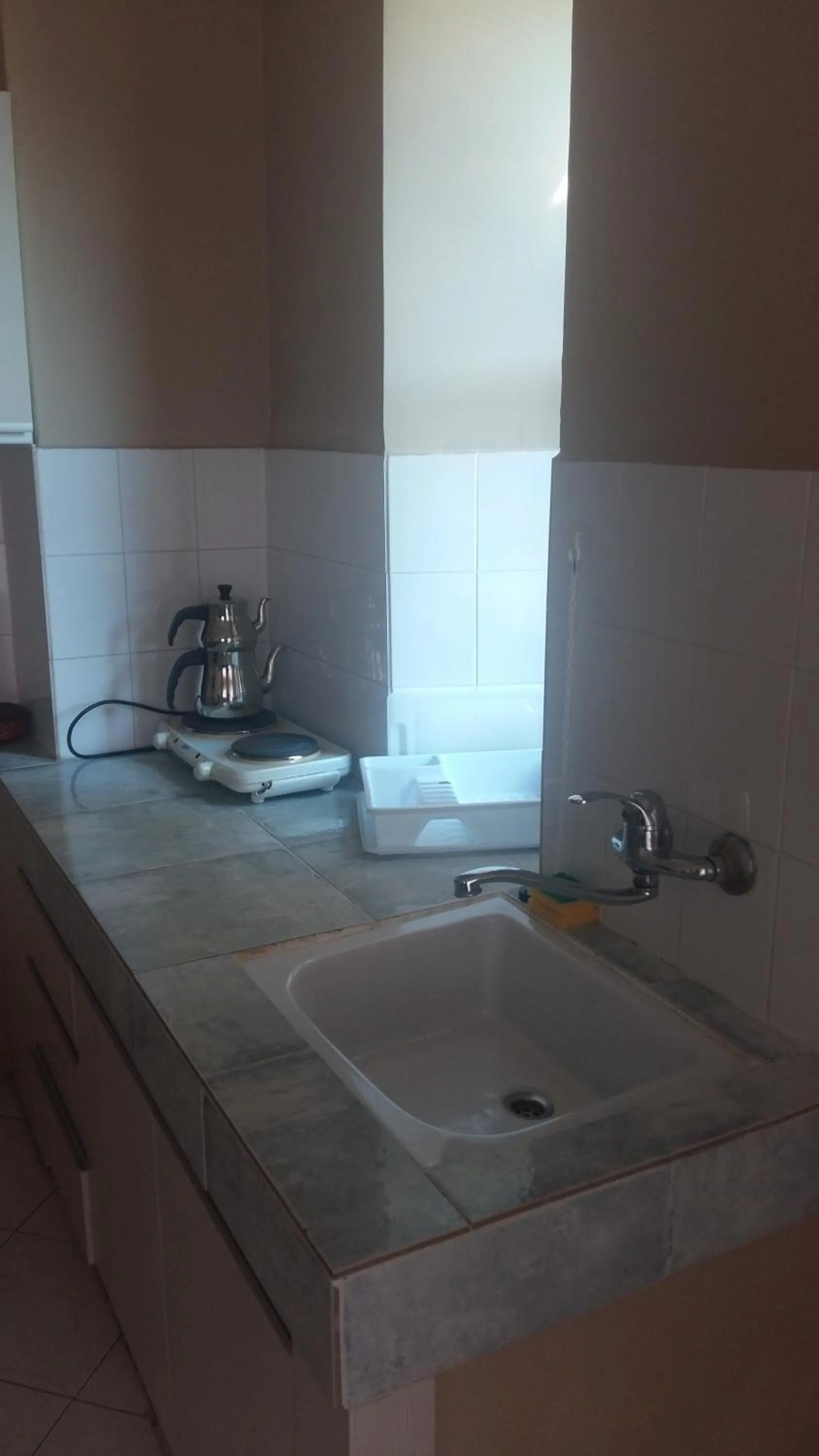 Kitchen or kitchenette in Musti Apart Hotel