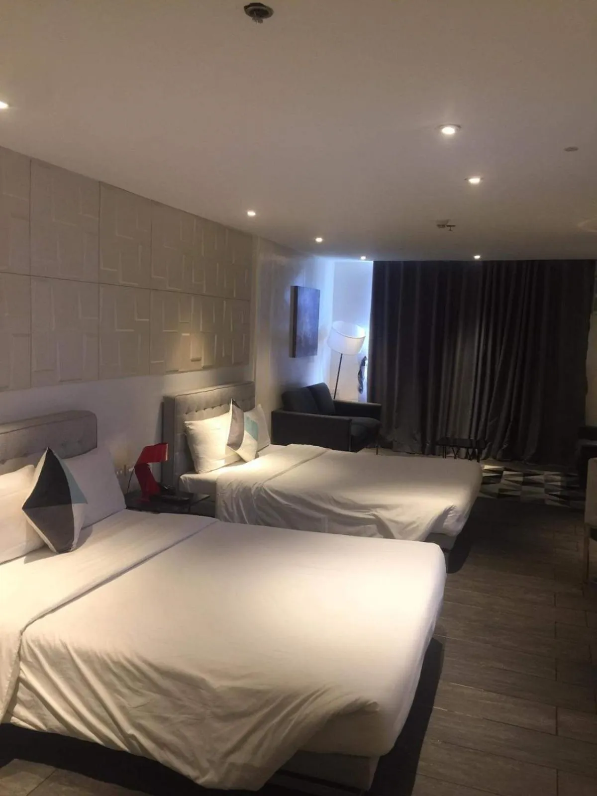 Bed in City Park Hotel Residences