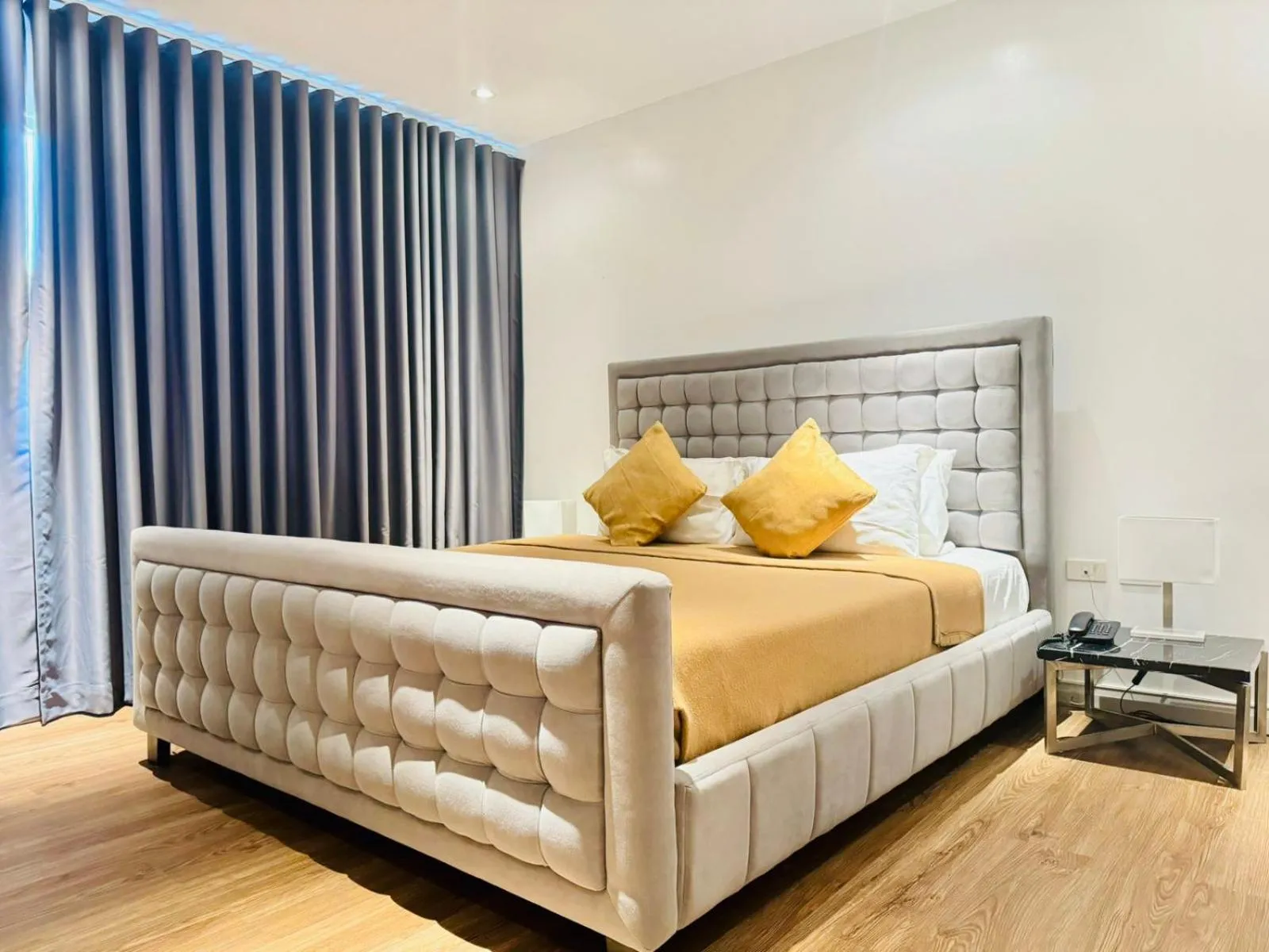 Bed in City Park Hotel Residences