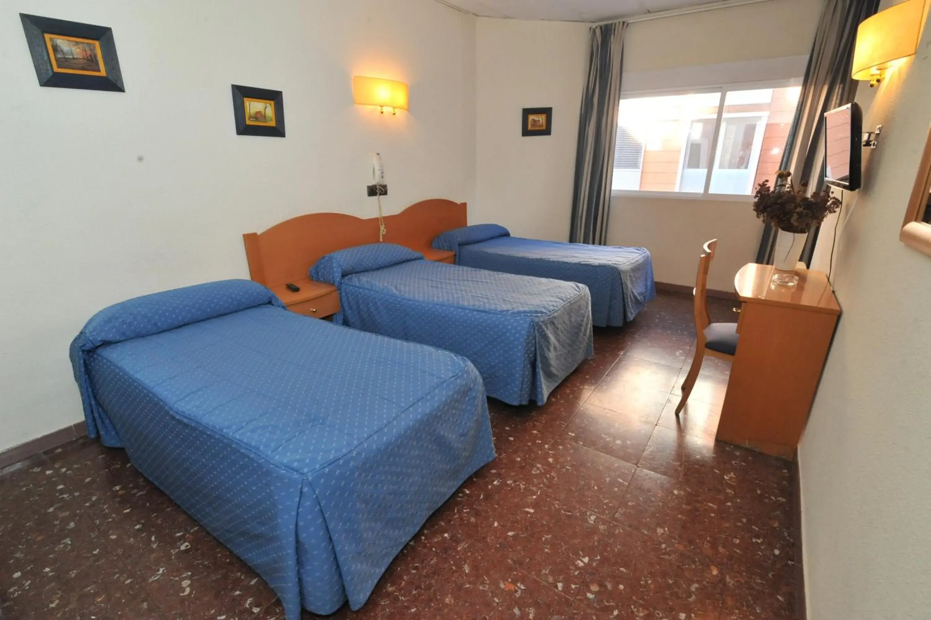 Triple Room in Hostal Goyma I Triple Room in Hostal Goyma I