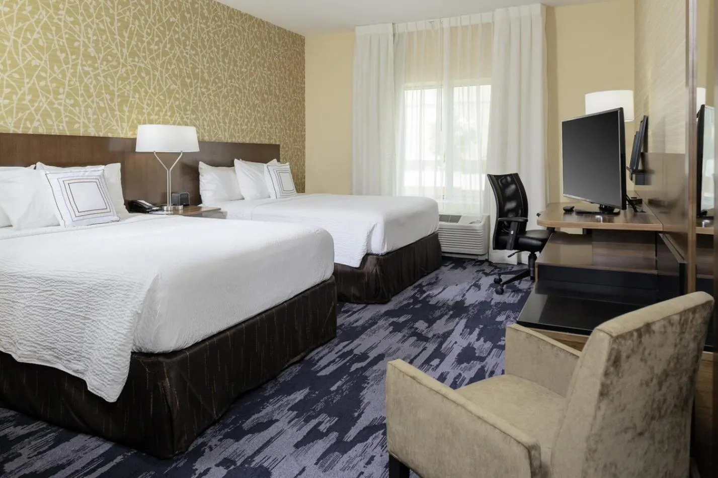 Bed in Fairfield Inn & Suites by Marriott Augusta Washington Rd./I-20