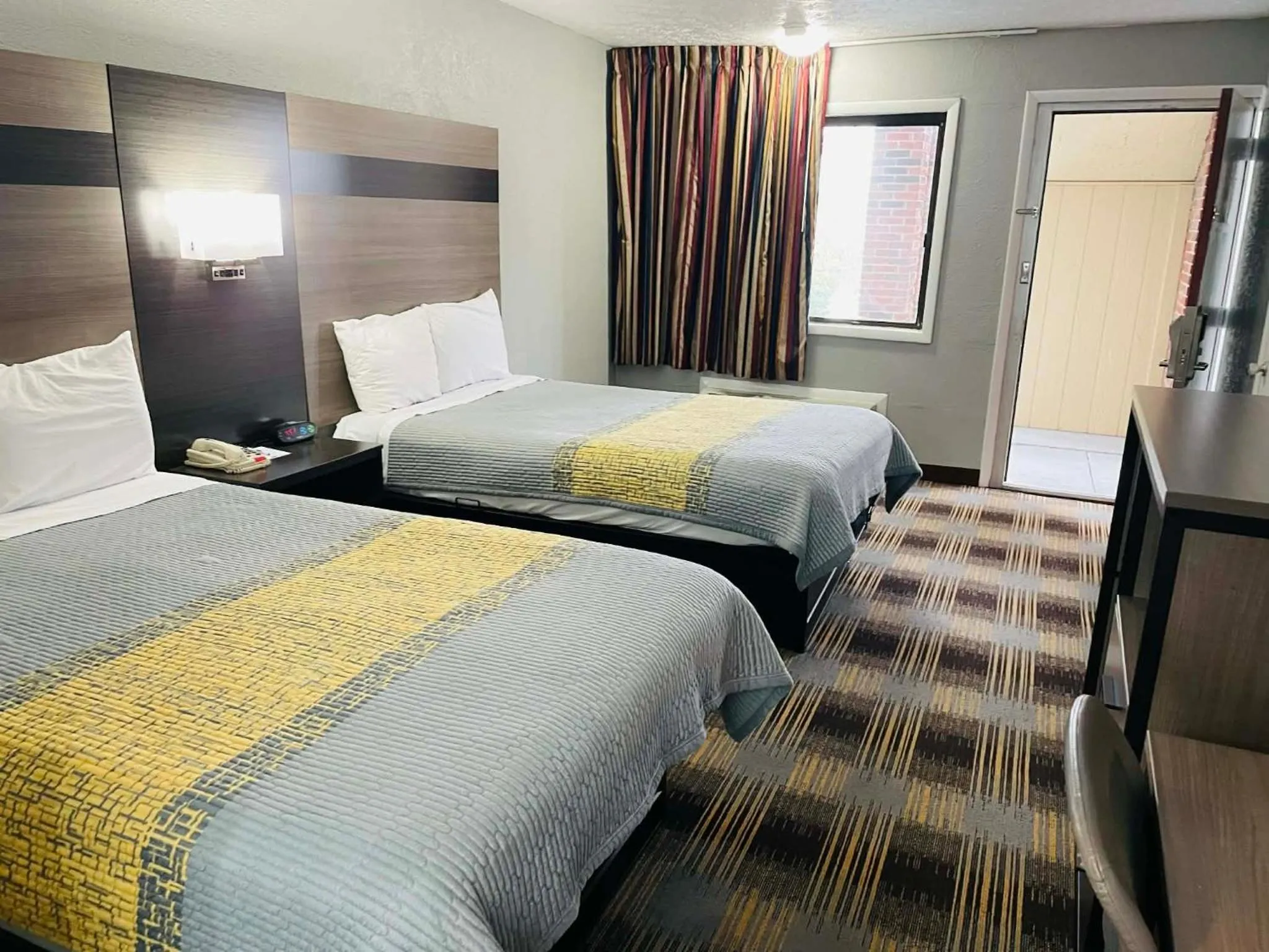 Bed in Travelodge by Wyndham Sellersburg