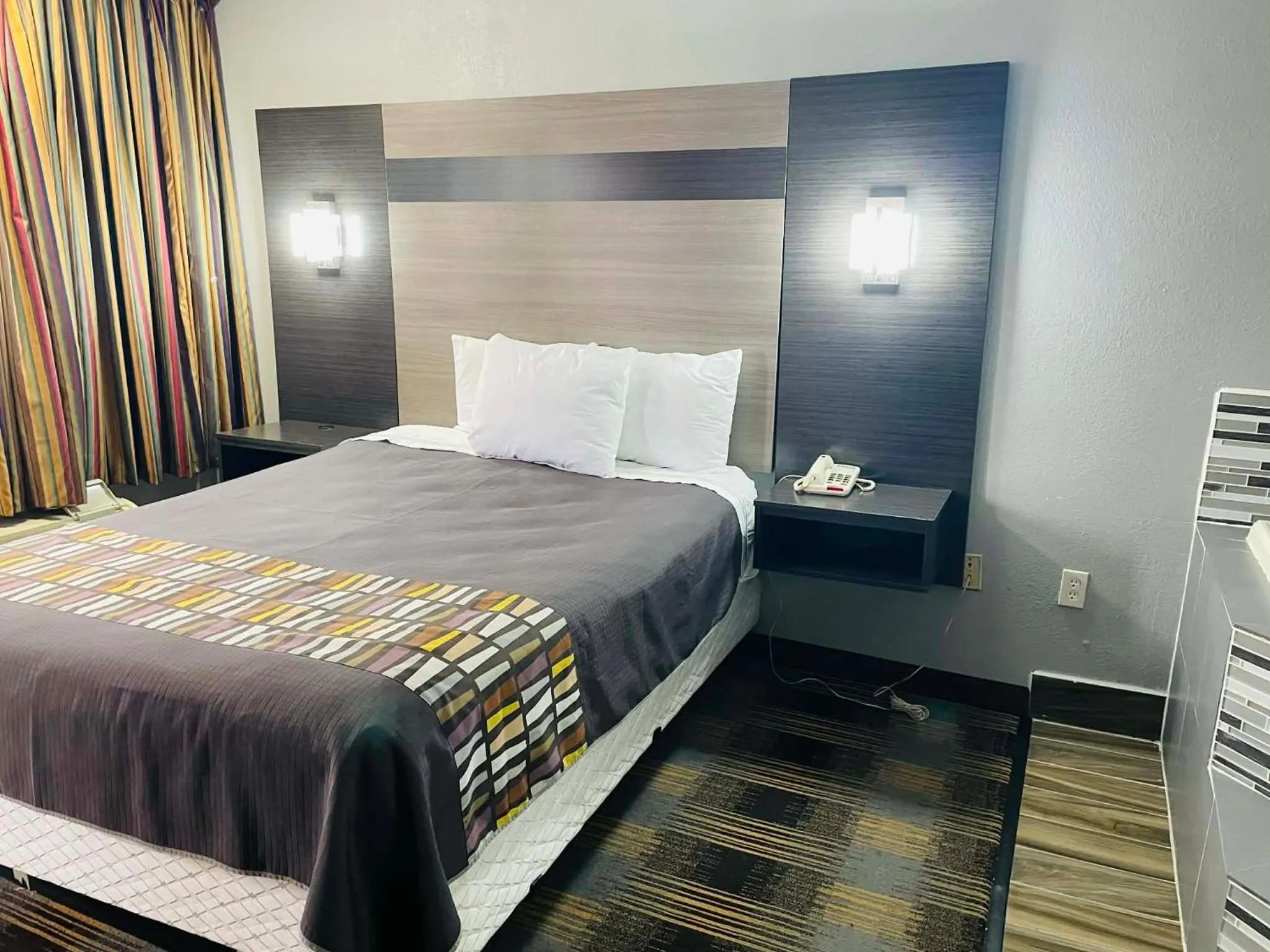 Bed in Travelodge by Wyndham Sellersburg