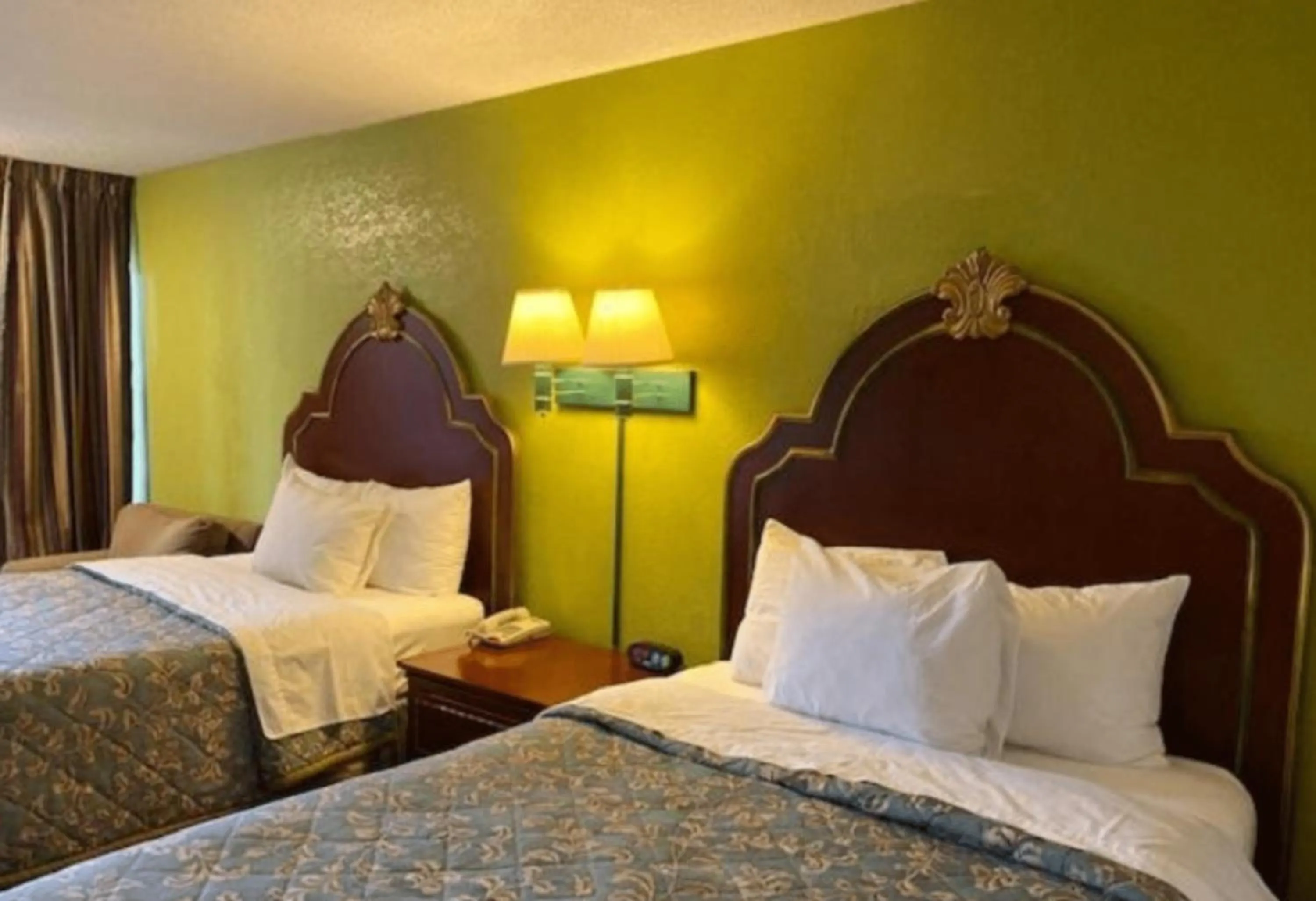 Bed in Travelodge by Wyndham Sellersburg