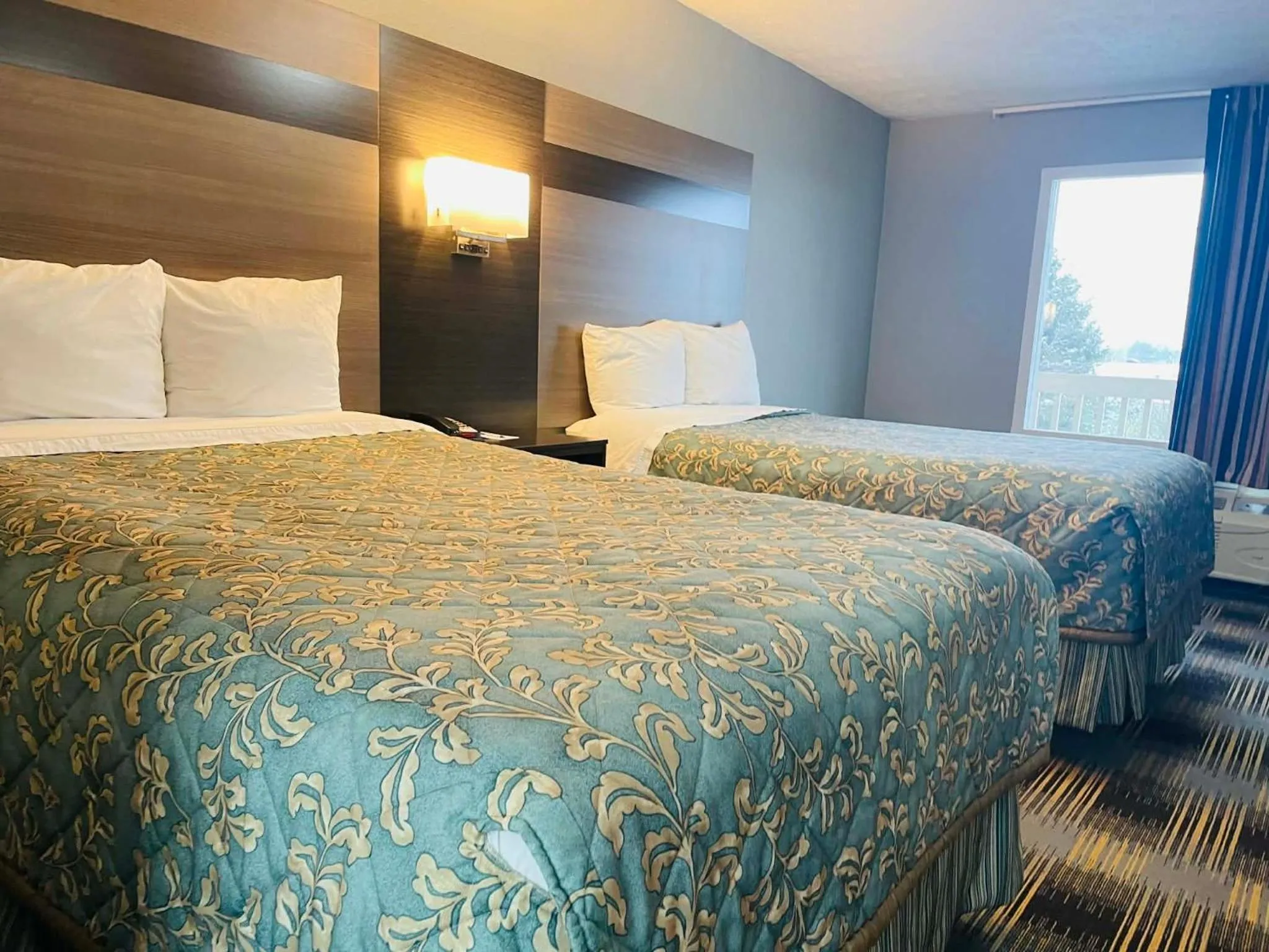 Bed in Travelodge by Wyndham Sellersburg