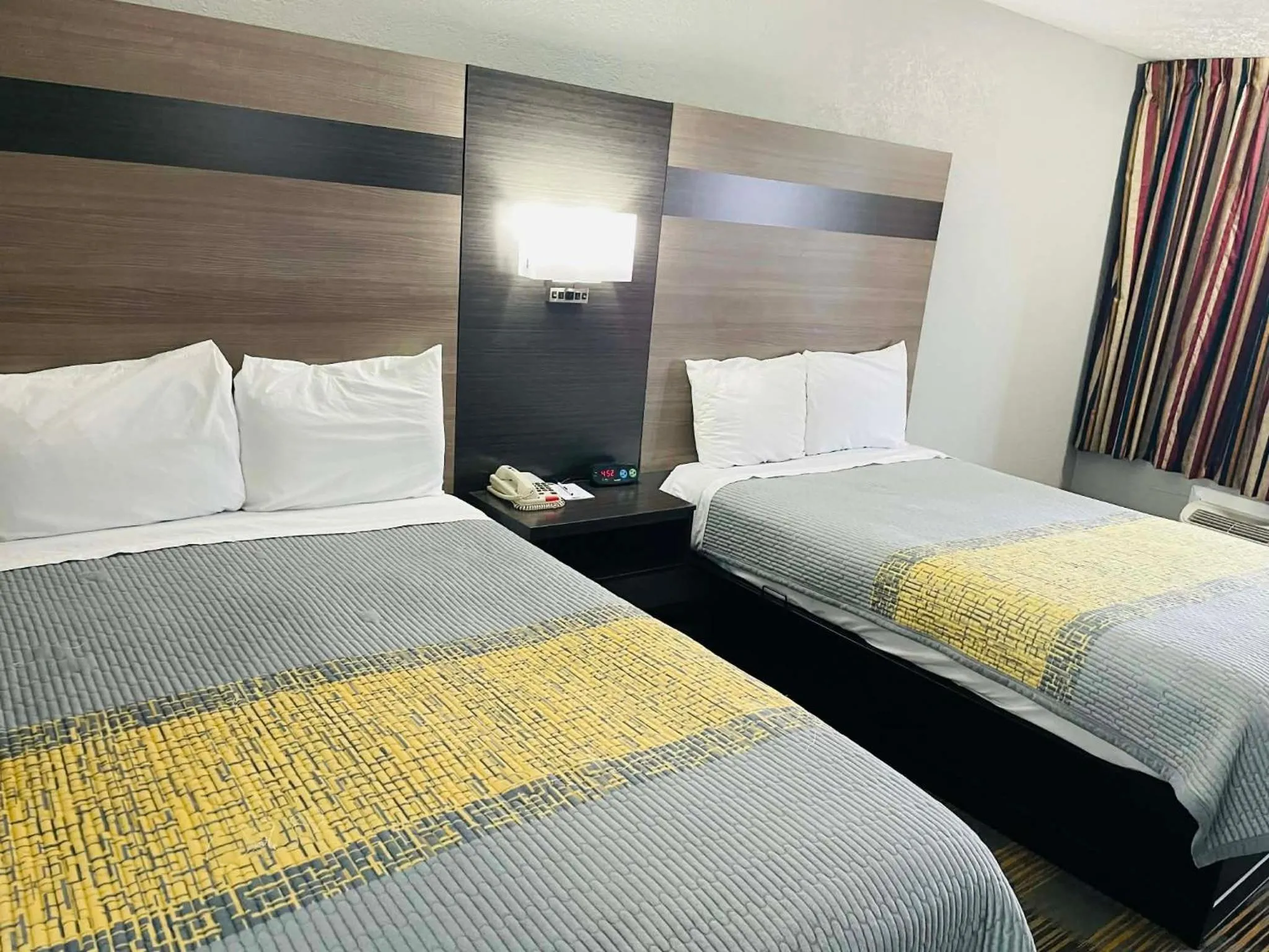 Bed in Travelodge by Wyndham Sellersburg