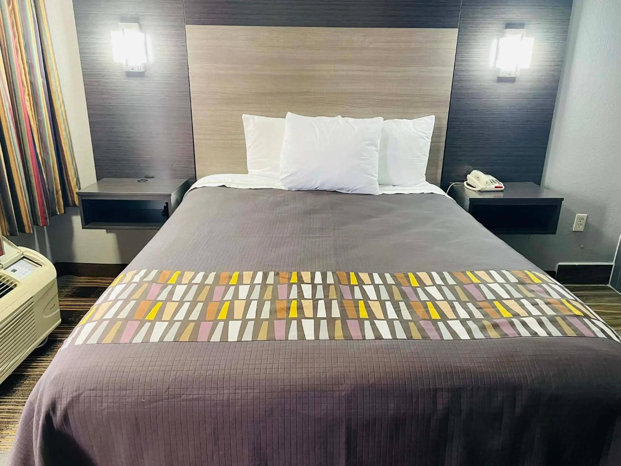 Bed in Travelodge by Wyndham Sellersburg