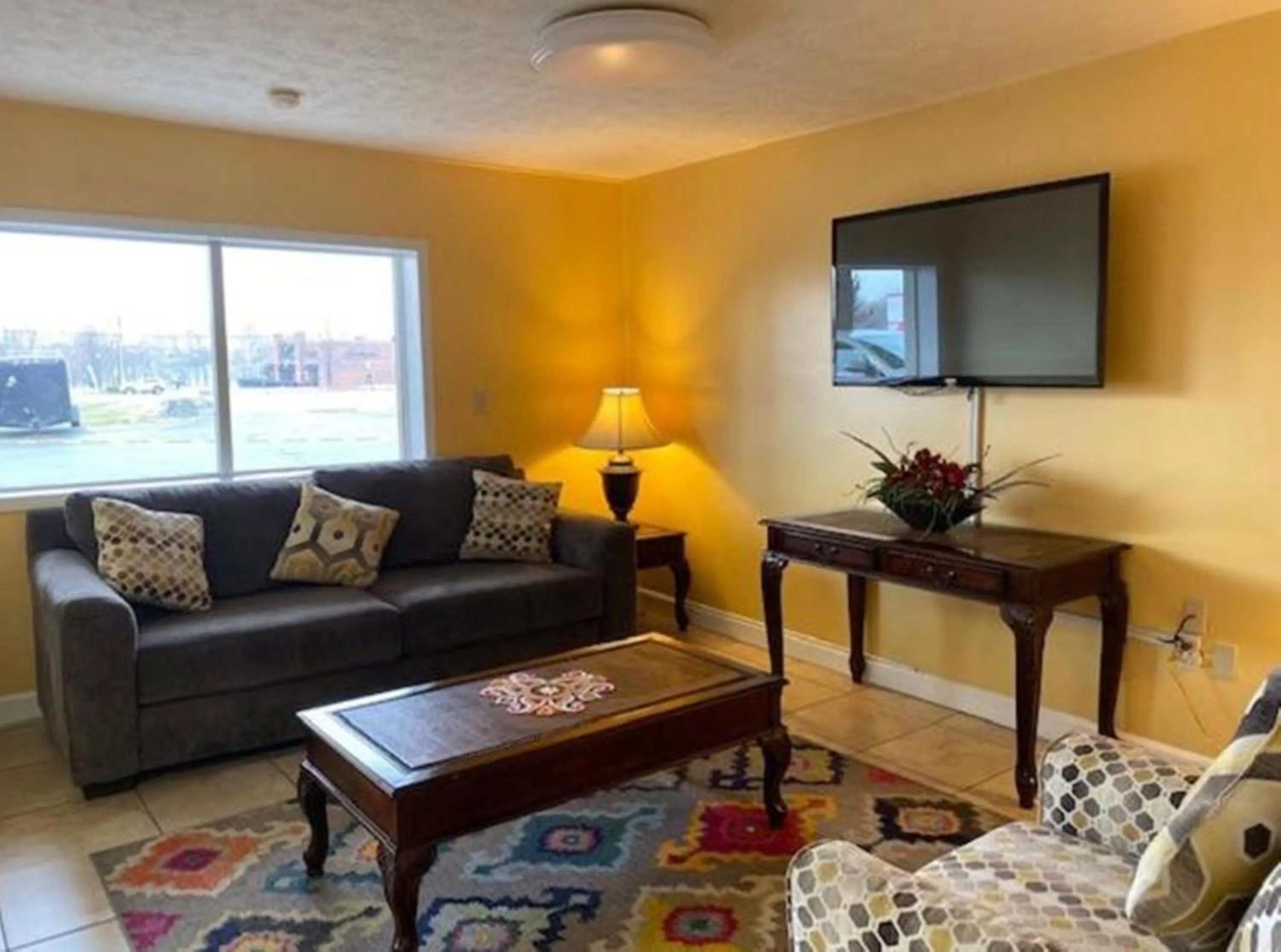 Seating area in Travelodge by Wyndham Sellersburg