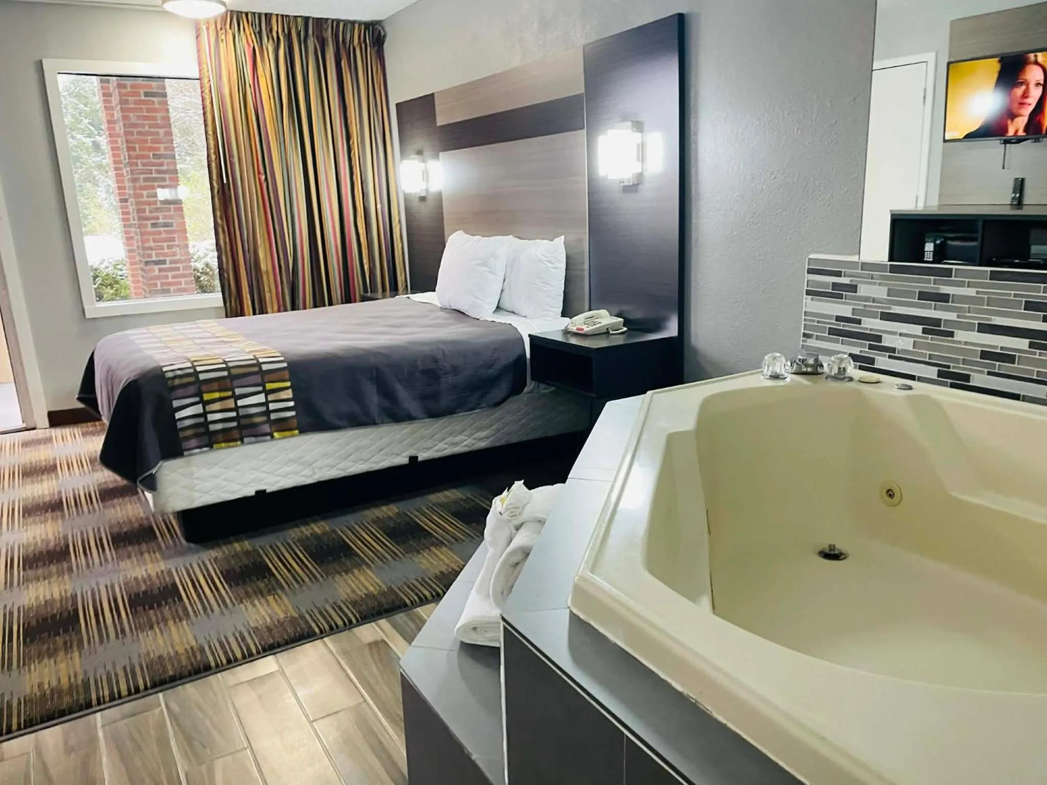 Bed in Travelodge by Wyndham Sellersburg