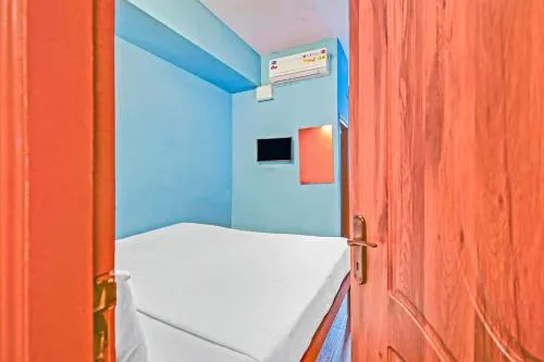 Bedroom, Bed in Hotel O Sri Sai Guru Comforts