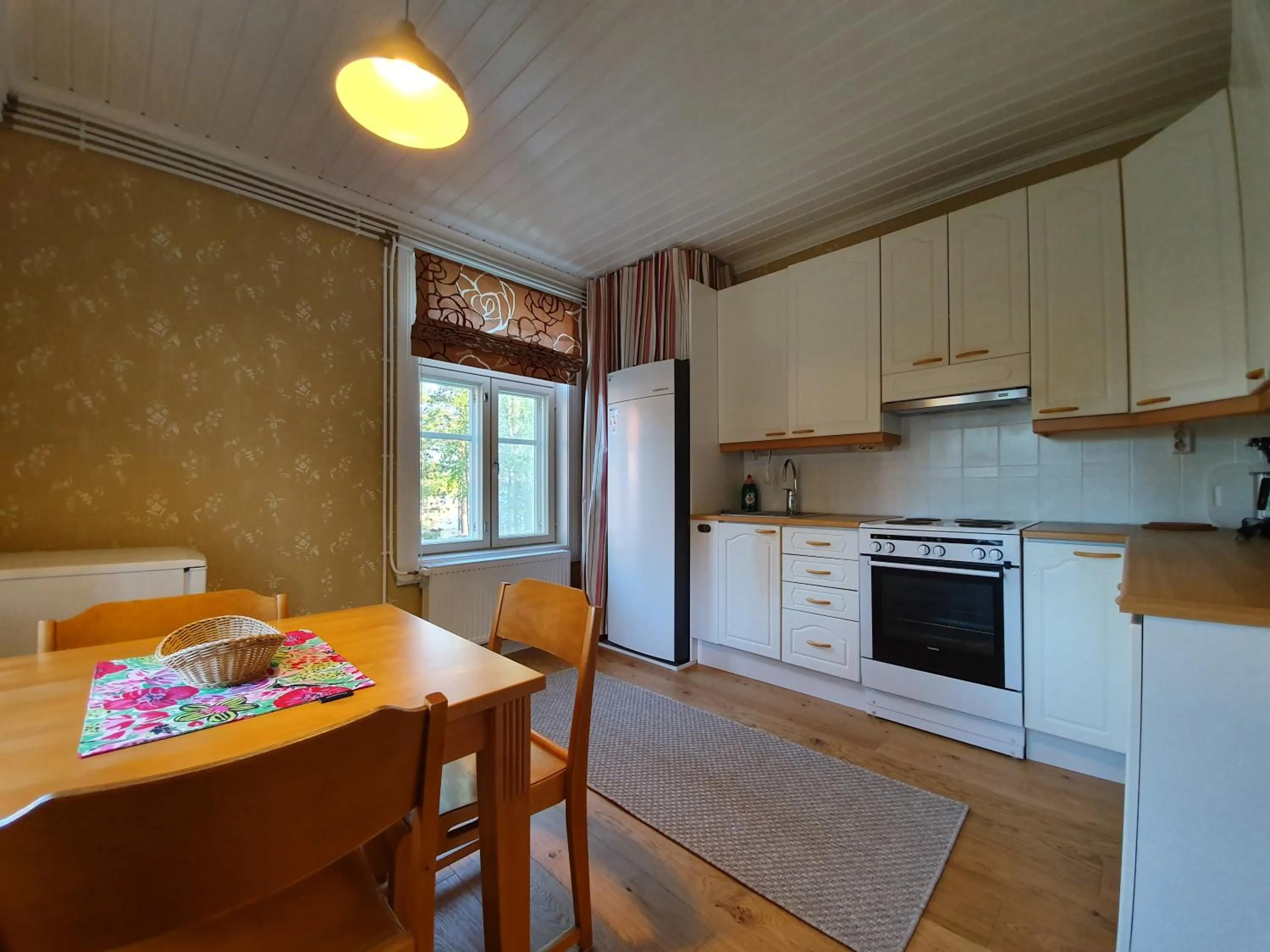 Kitchen or kitchenette in B&B Taipaleenniemi