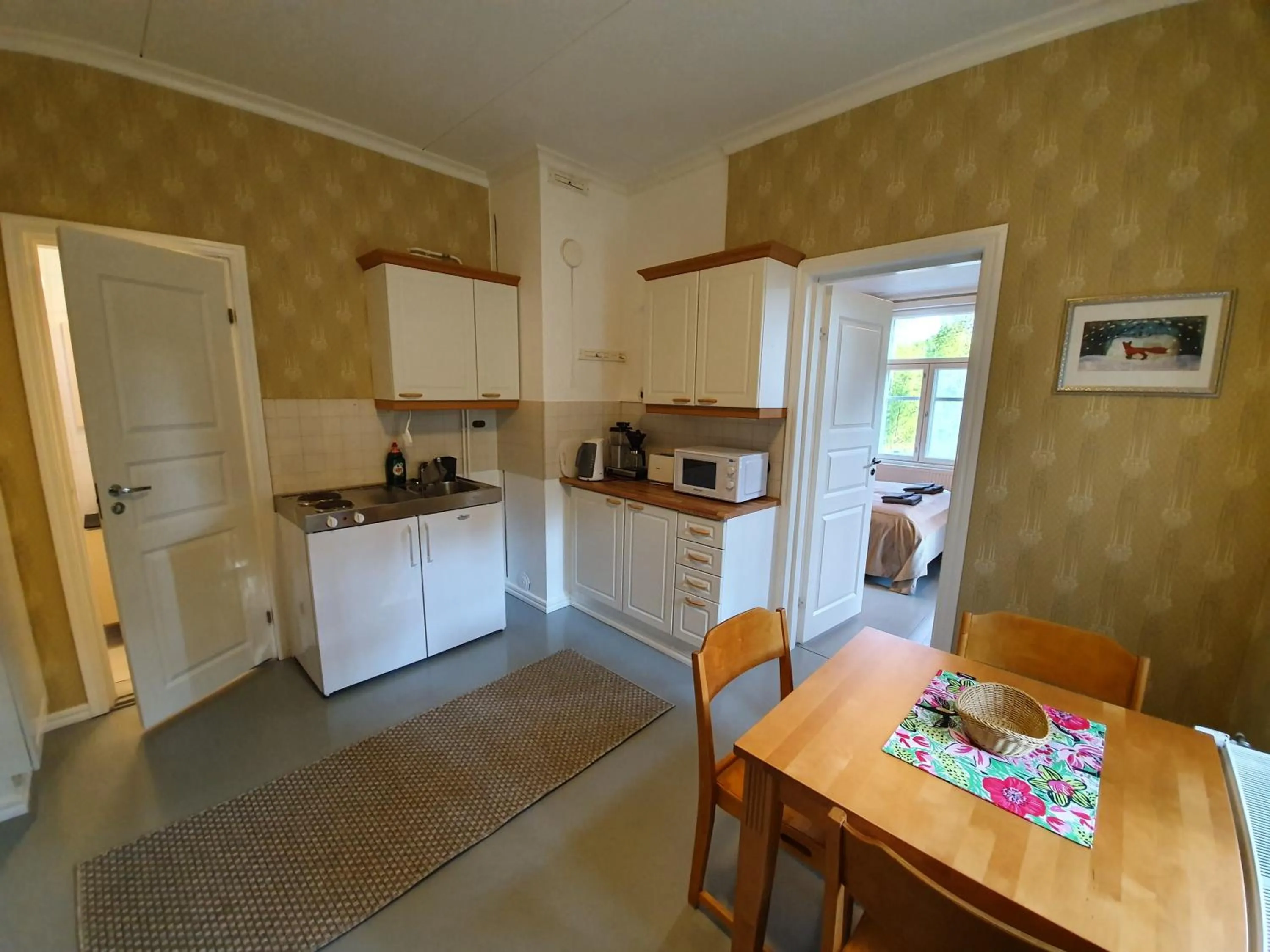 Kitchen or kitchenette in B&B Taipaleenniemi