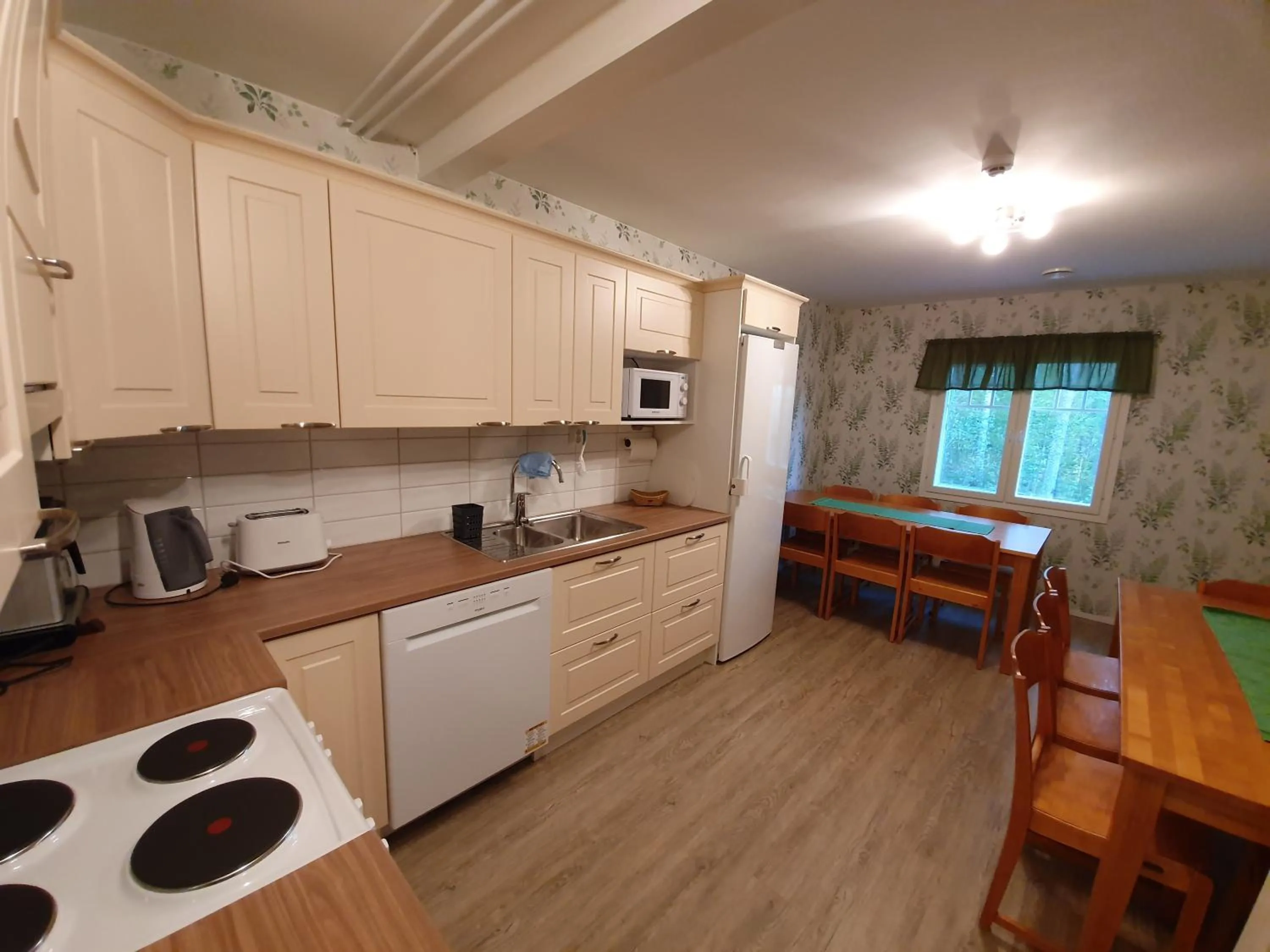 Communal kitchen in B&B Taipaleenniemi