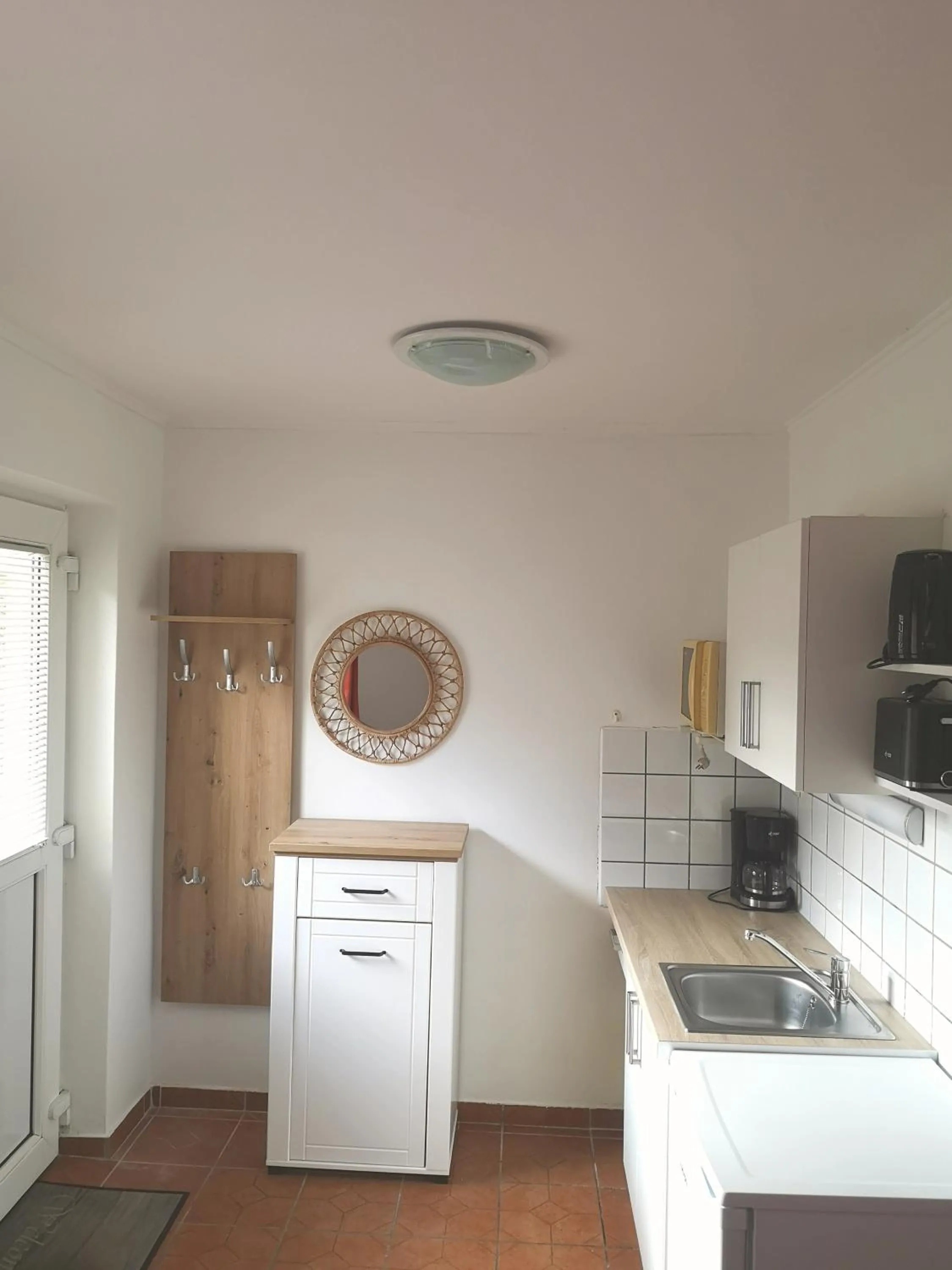 Kitchen or kitchenette in Apartman Kaszás Garden