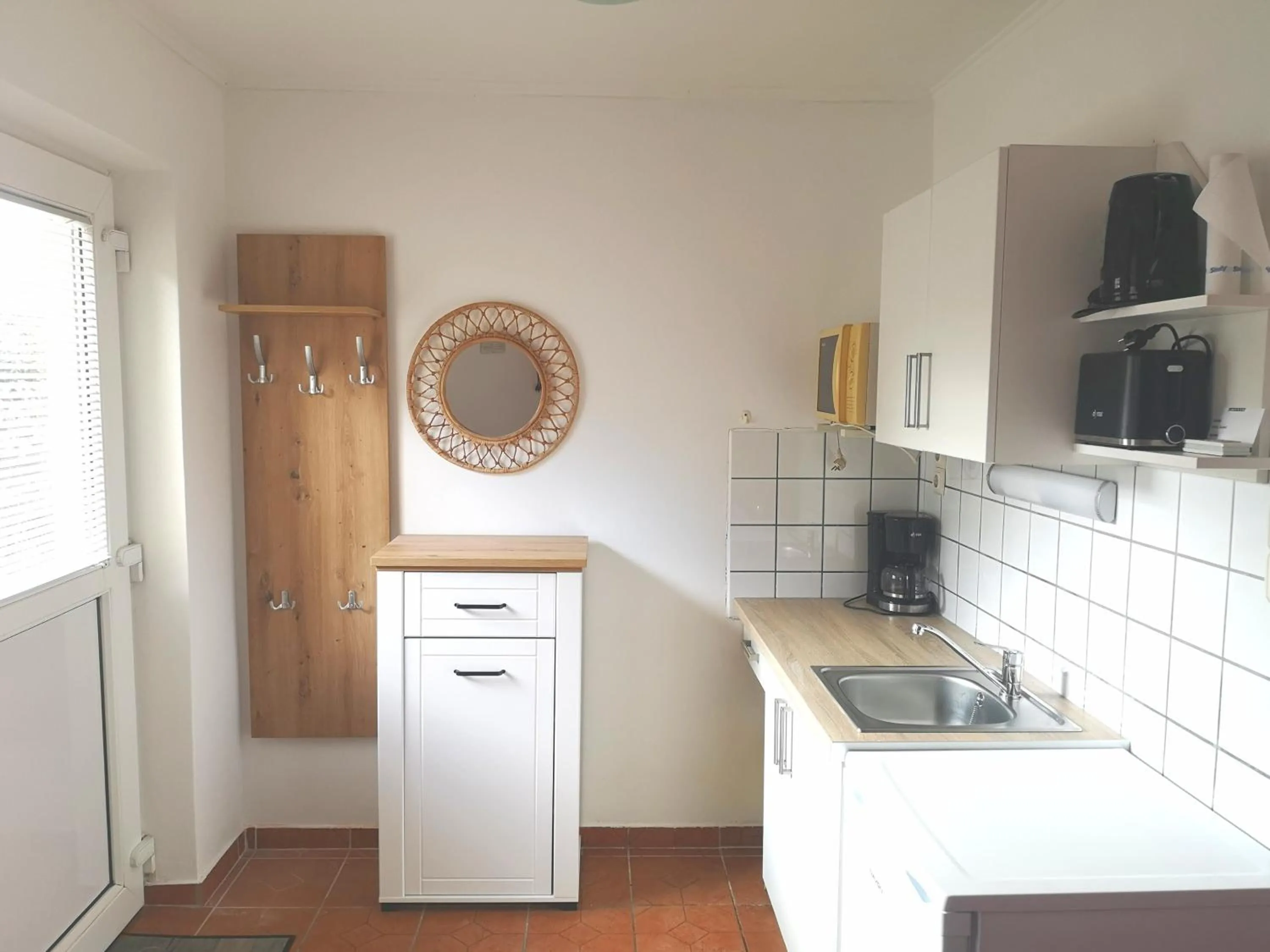 Kitchen or kitchenette in Apartman Kaszás Garden