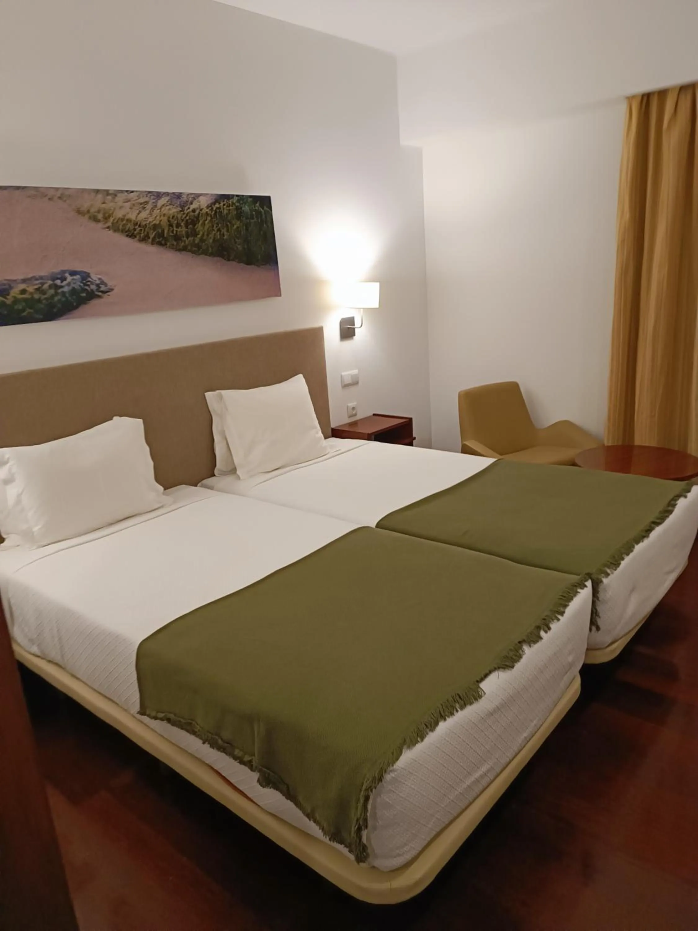 Bed in Hotel Porto Santo & Spa