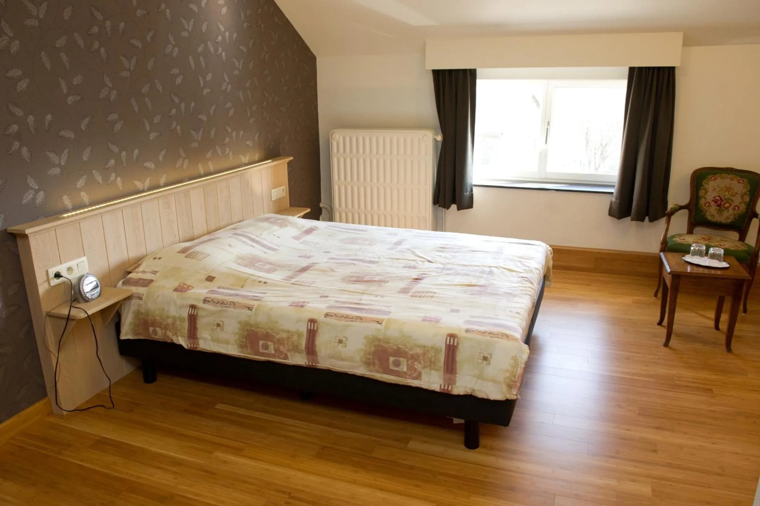 Decorative detail, Bed in Auberge Saint-Martin