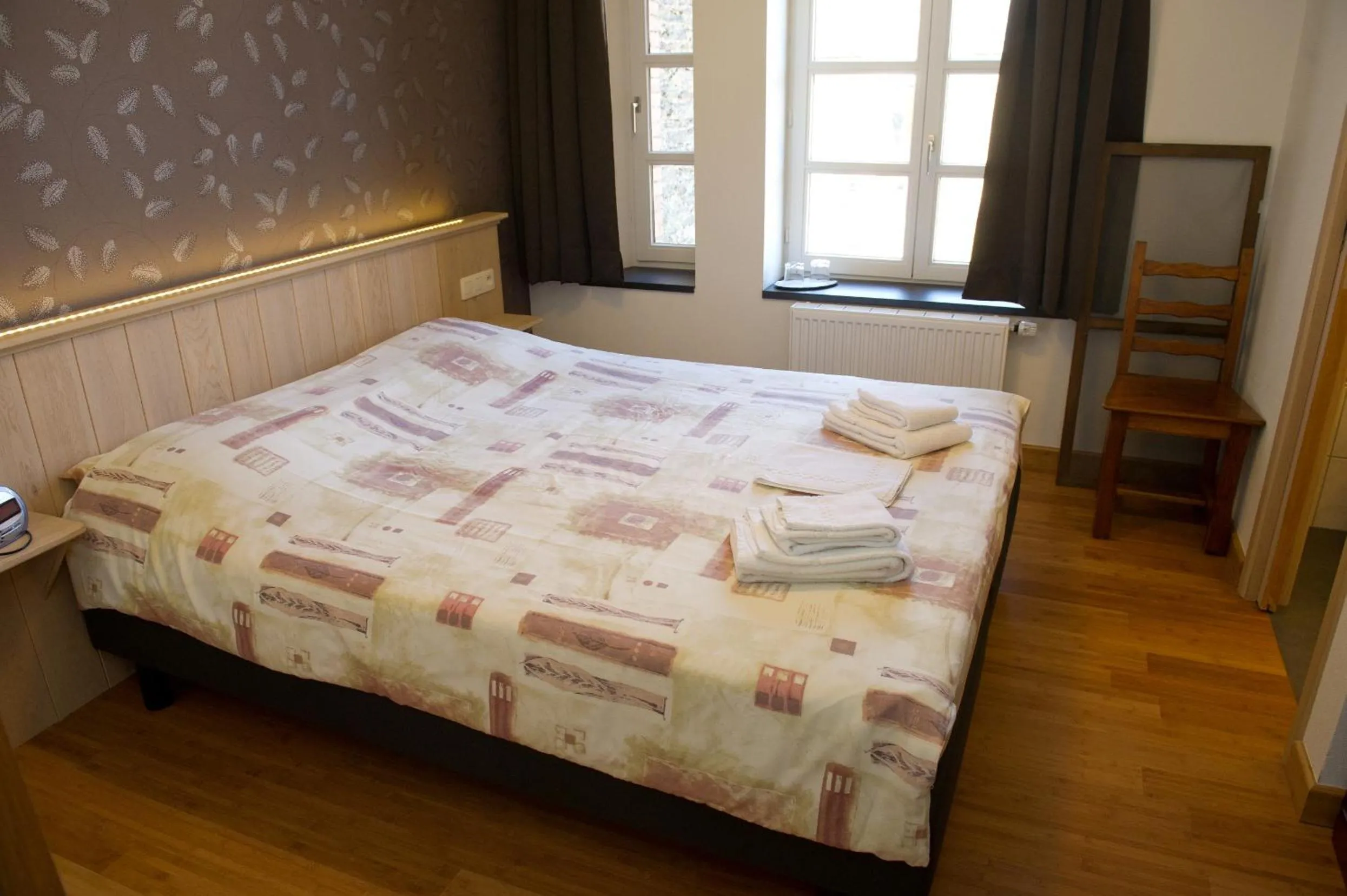 Decorative detail, Bed in Auberge Saint-Martin