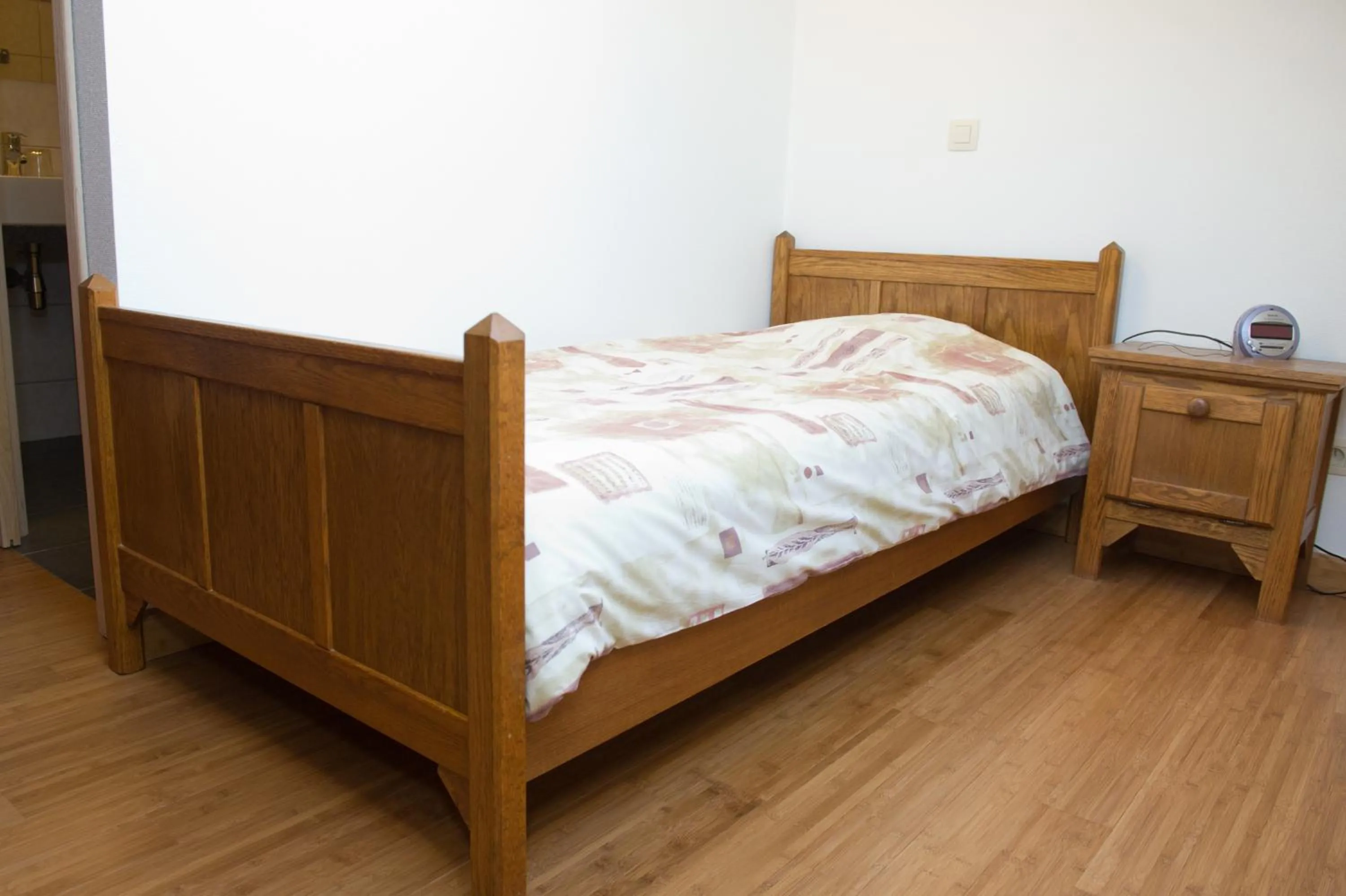 Decorative detail, Bed in Auberge Saint-Martin
