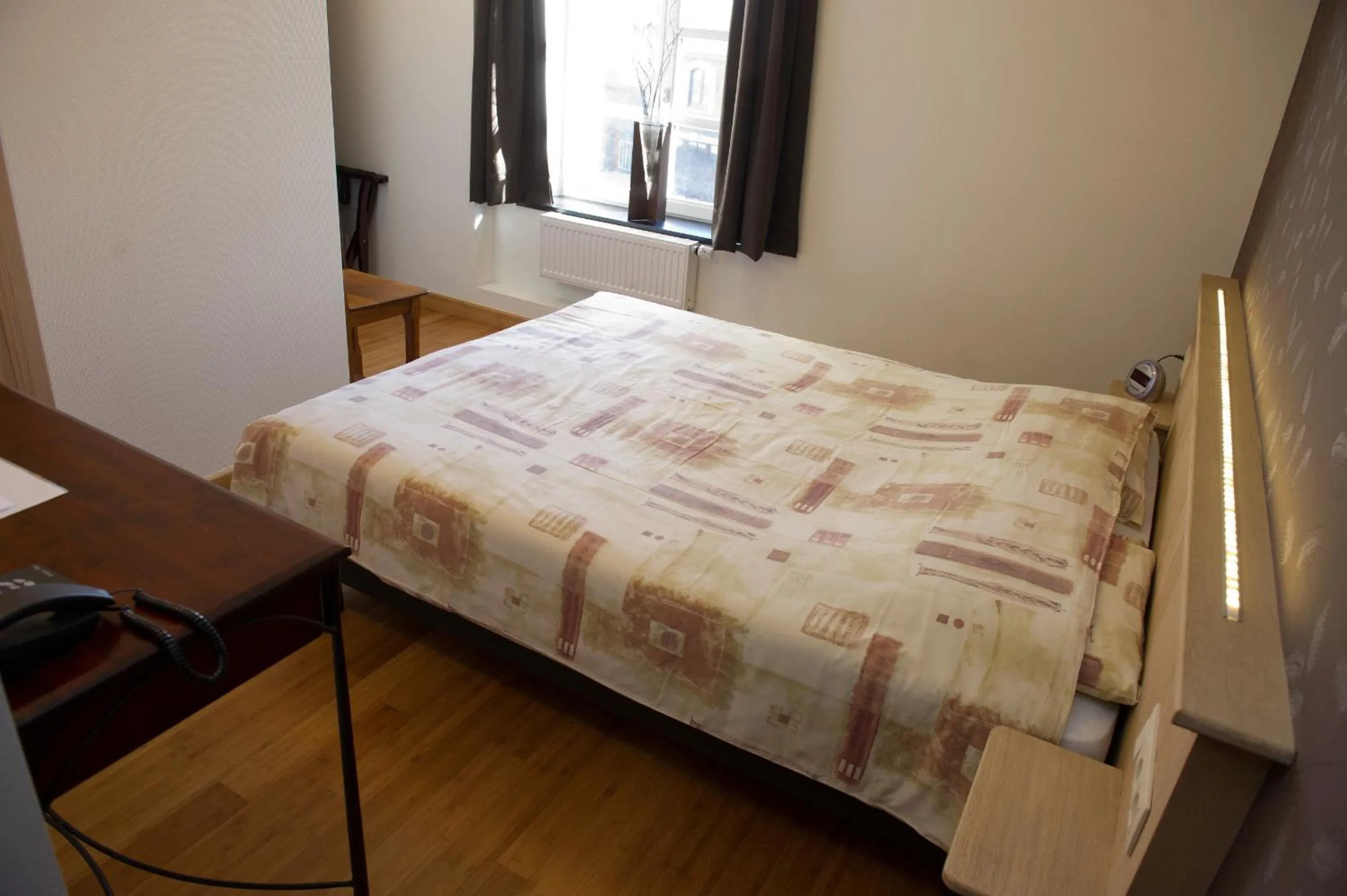 Decorative detail, Bed in Auberge Saint-Martin