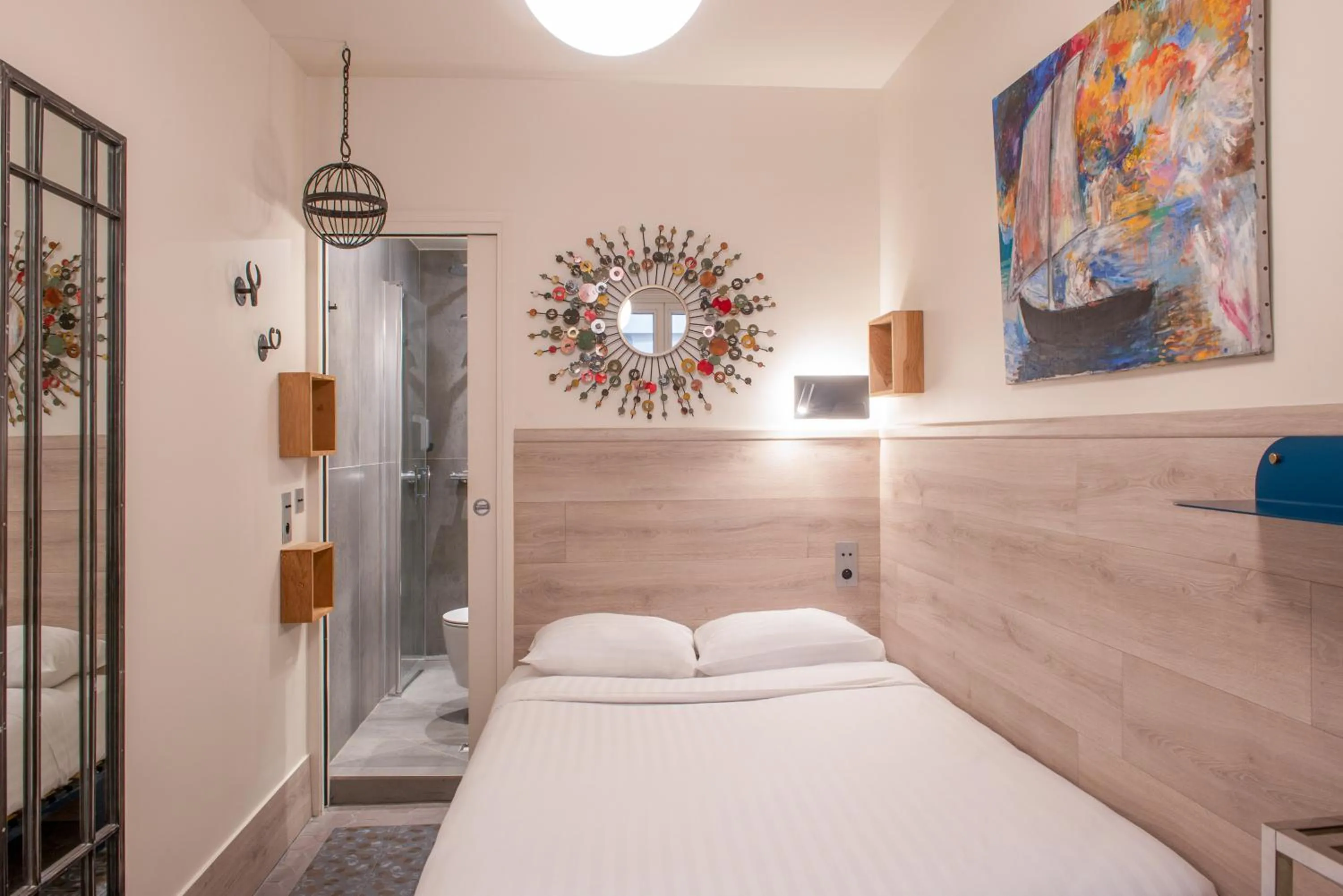 Bed in Hôtel de Roubaix