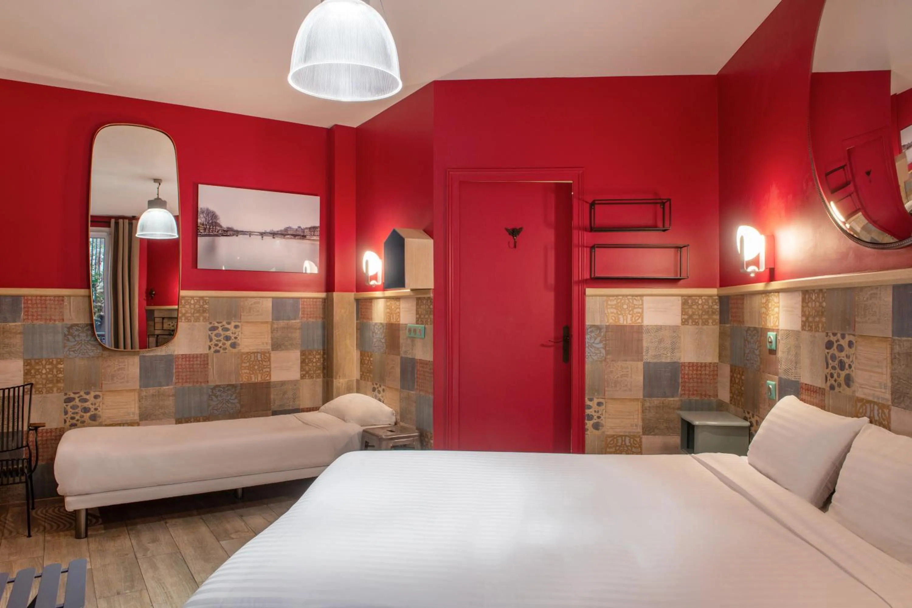 Bed in Hôtel de Roubaix