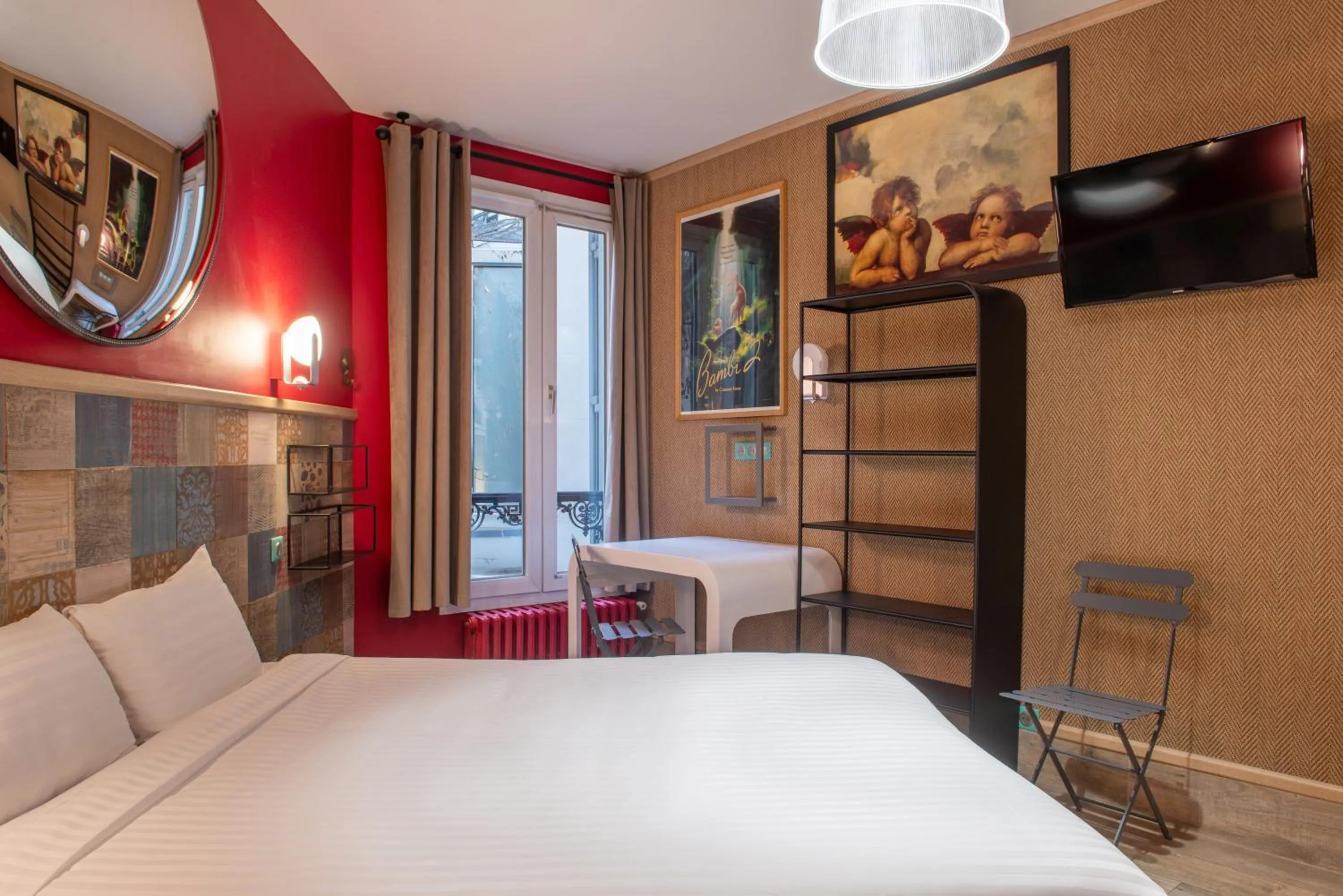 Bed in Hôtel de Roubaix