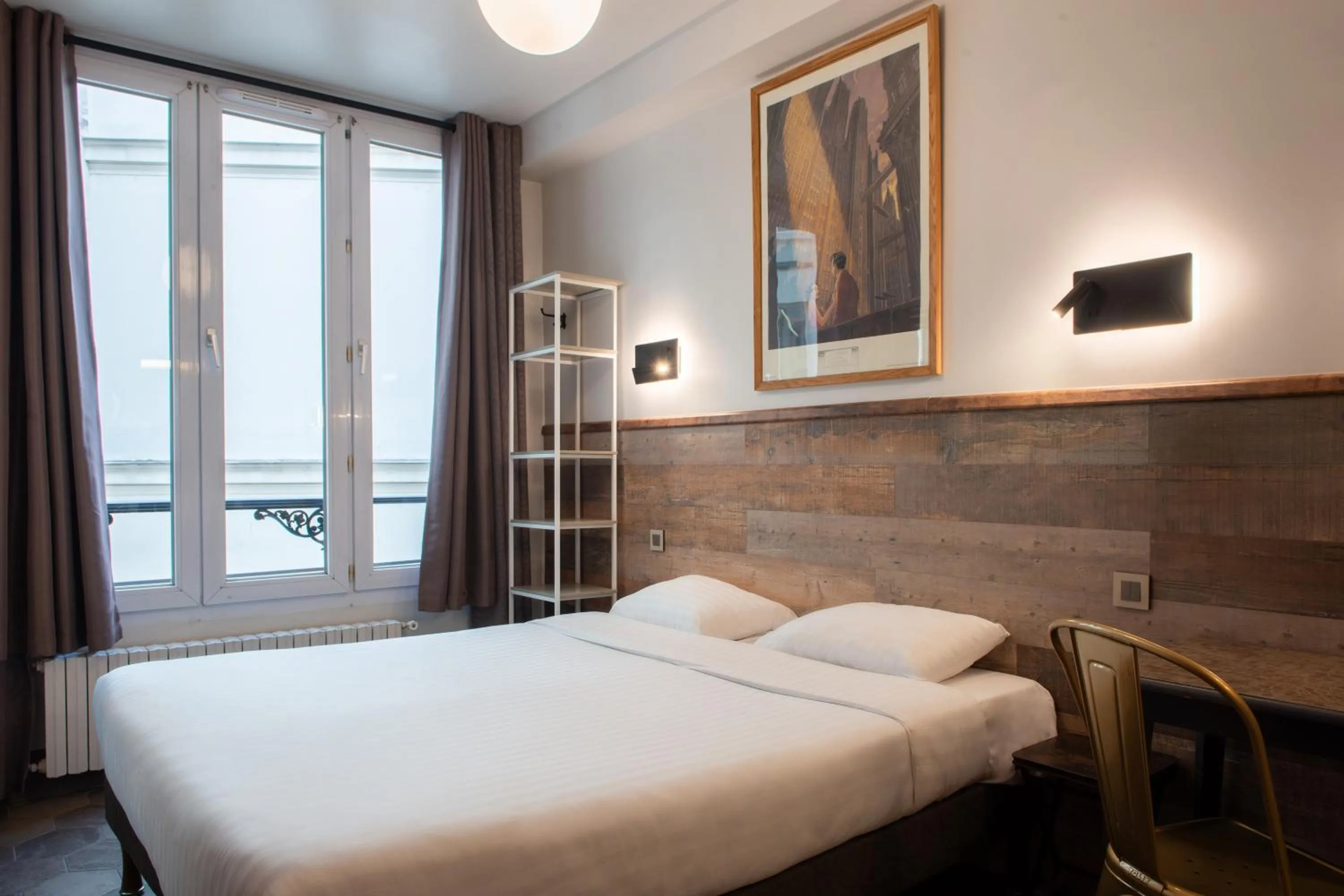 Bed in Hôtel de Roubaix