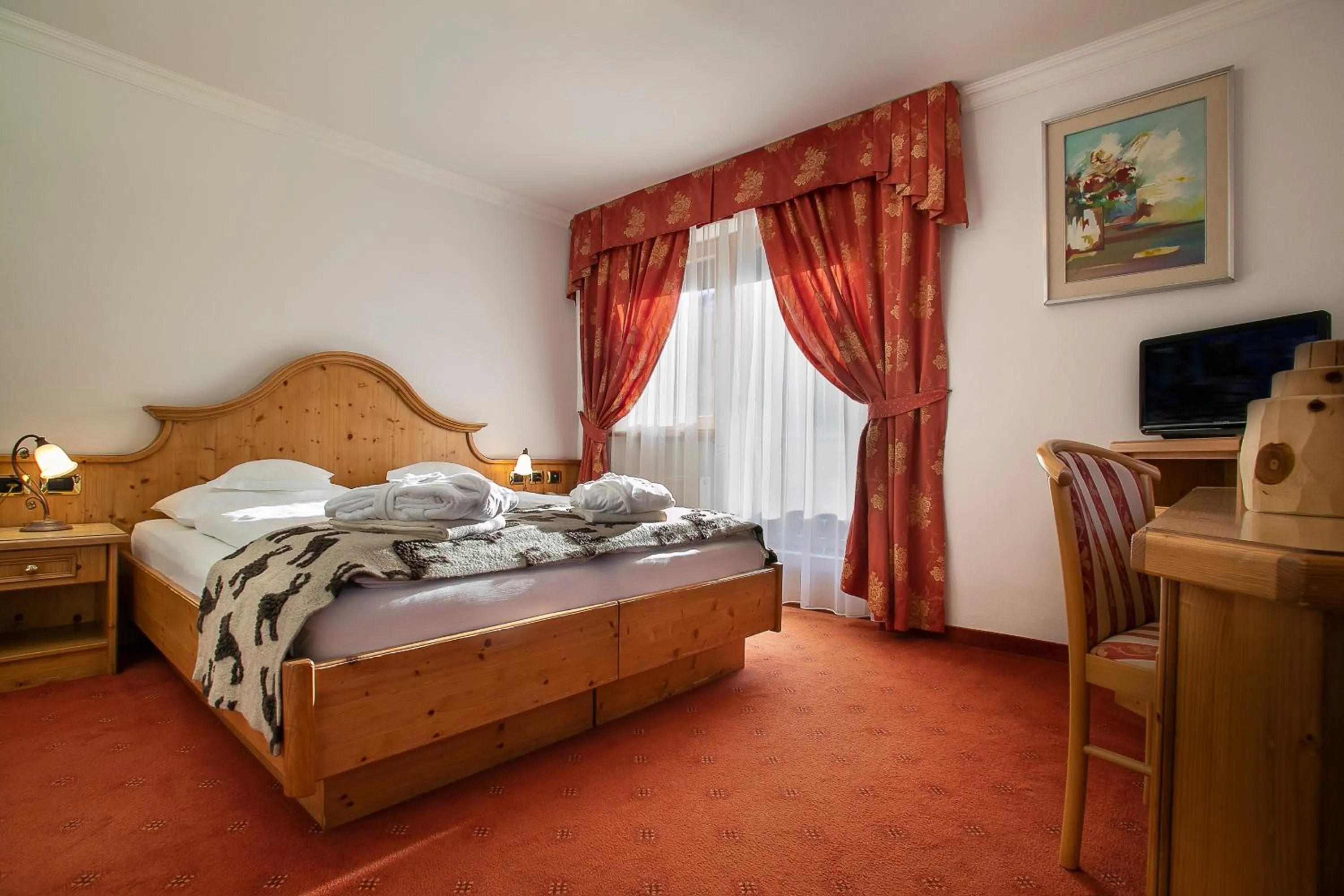 Bed in Hotel Alpenrose