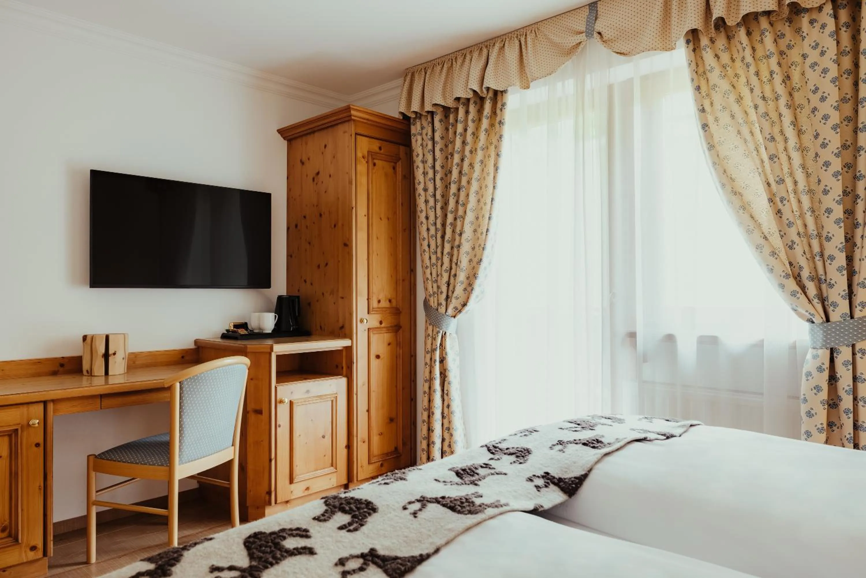 Bed in Hotel Alpenrose