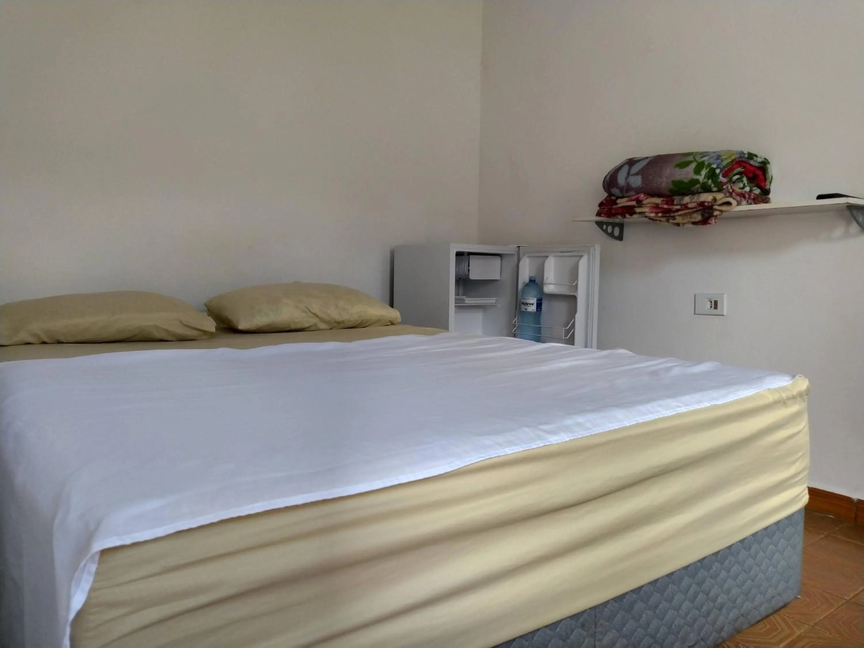 Bed in Pousada Recanto da Praia