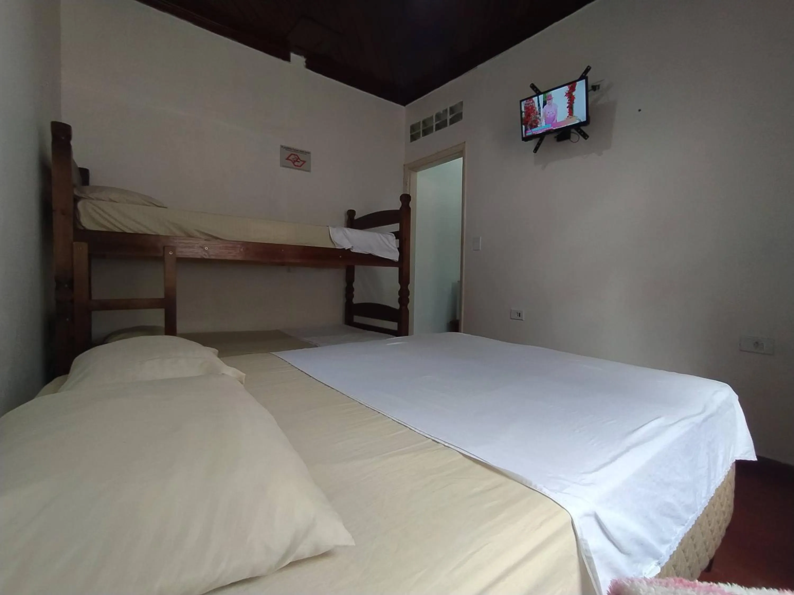 Bed in Pousada Recanto da Praia