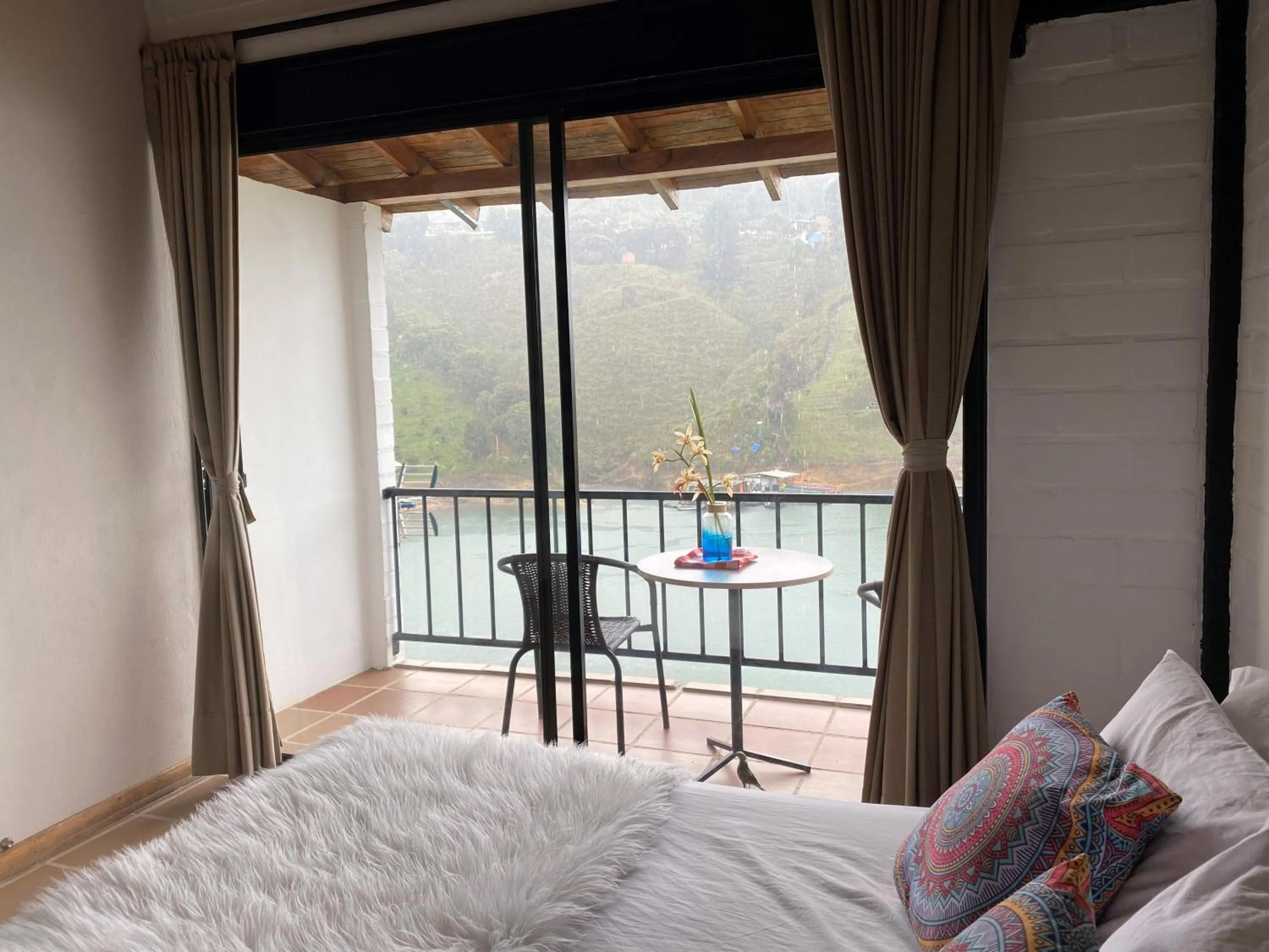 Balcony/Terrace, Bed in Ecolodge Bahia del Peñón